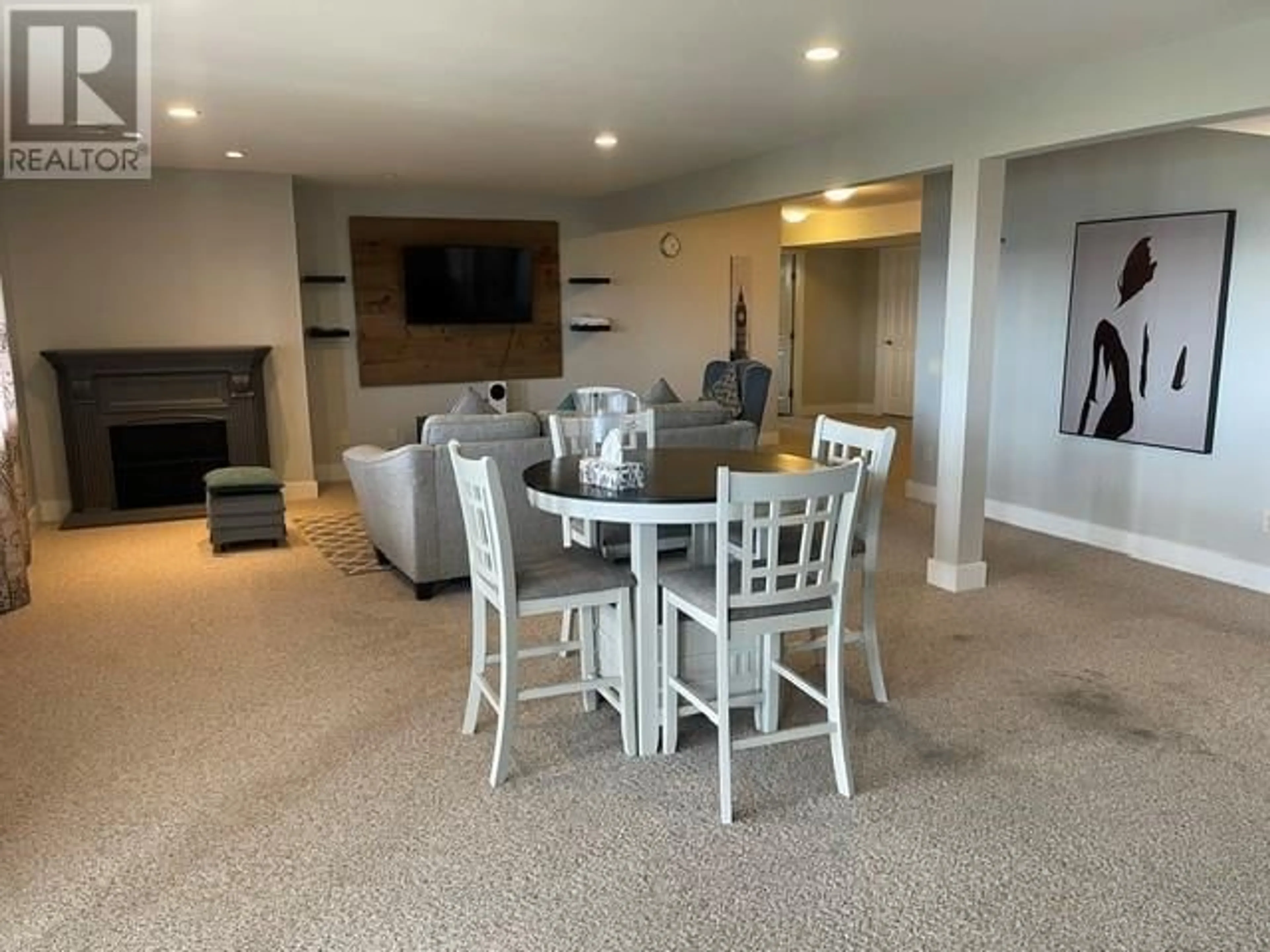 Living room with furniture, unknown for 1647 SUNRISE ROAD, Kelowna British Columbia V1P1N9