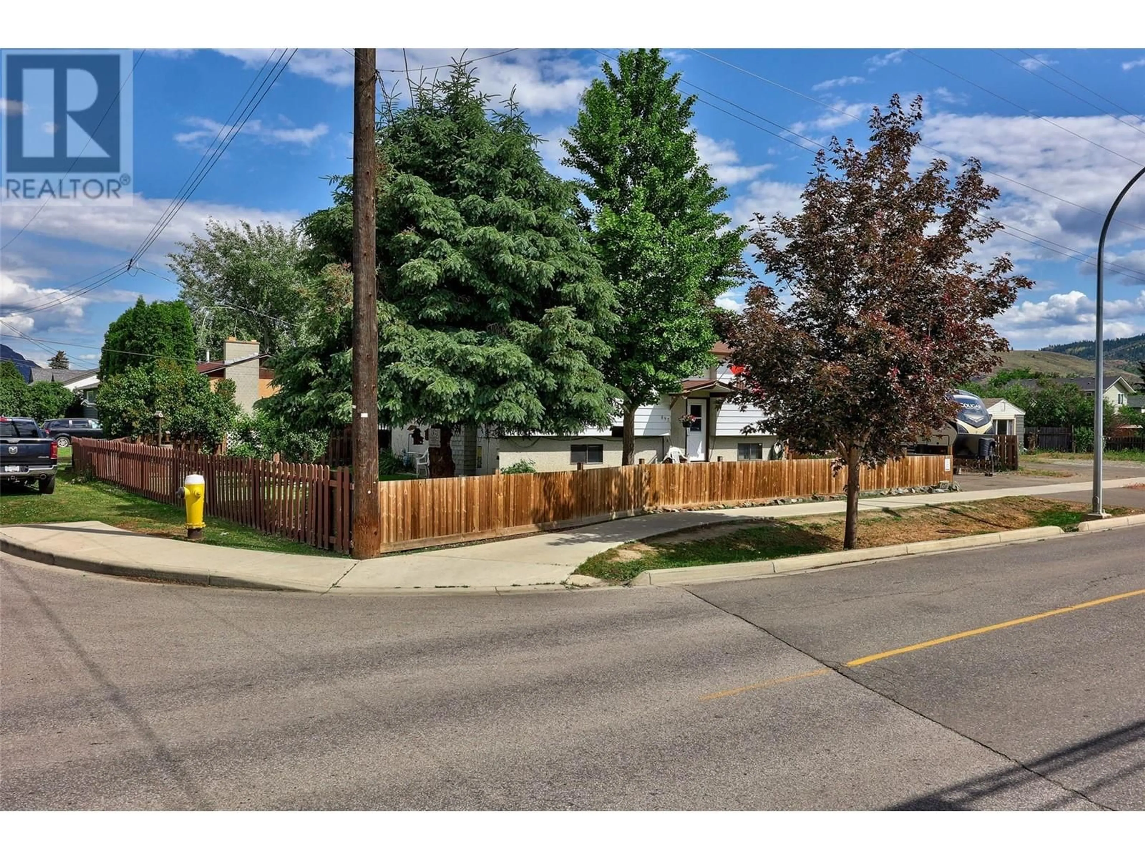 A pic from outside/outdoor area/front of a property/back of a property/a pic from drone, street for 897 WINDBREAK STREET, Kamloops British Columbia V2B5N9