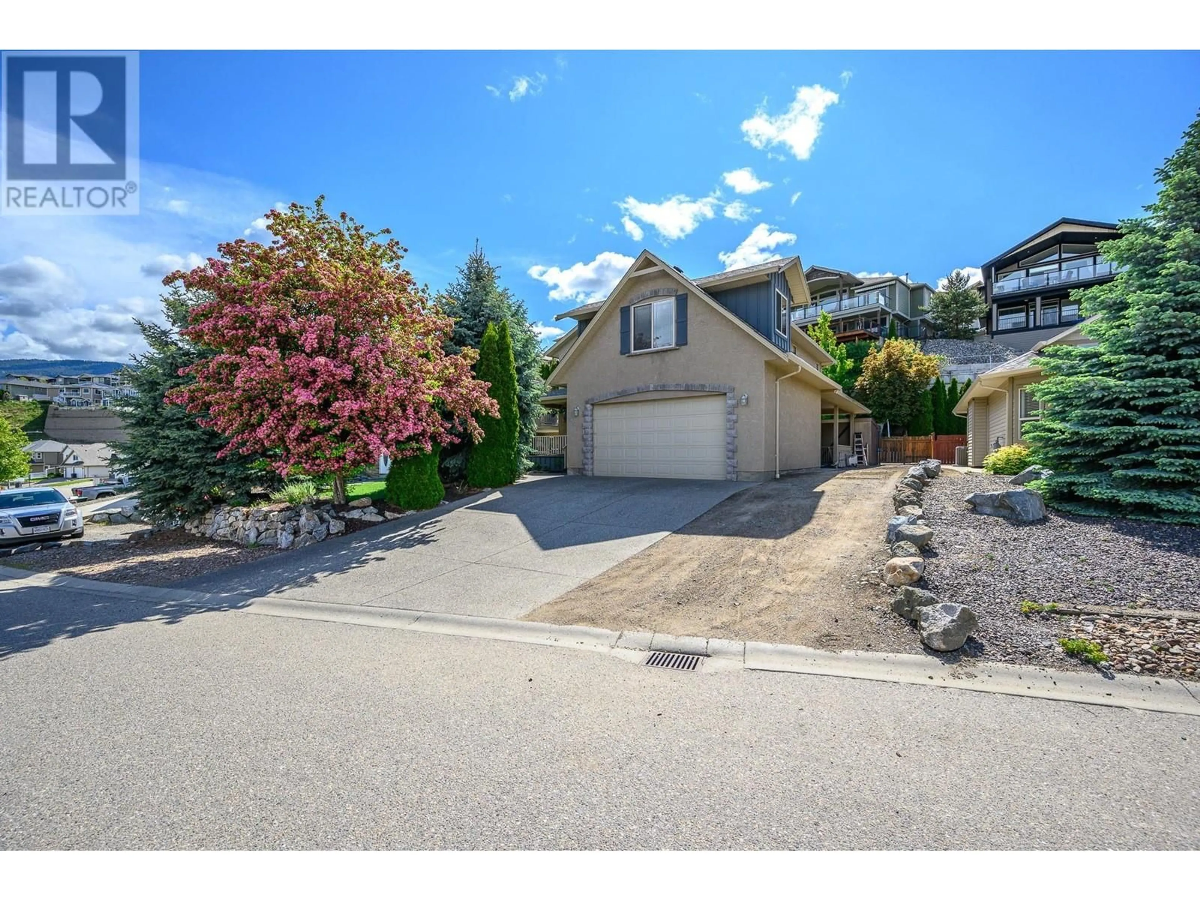 A pic from outside/outdoor area/front of a property/back of a property/a pic from drone, street for 955 MT BEGBIE DRIVE, Vernon British Columbia V1B2Z5