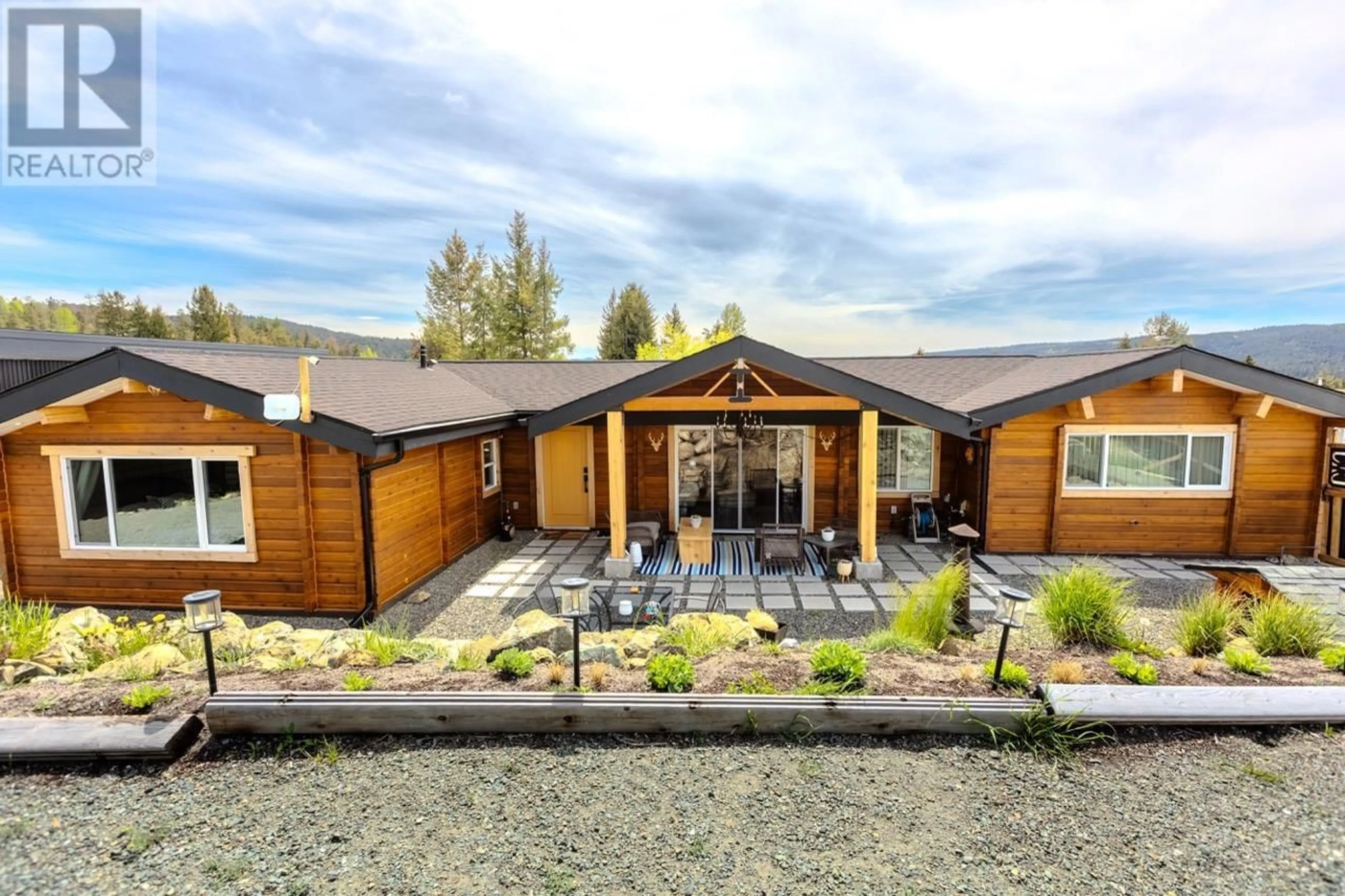 A pic from outside/outdoor area/front of a property/back of a property/a pic from drone, unknown for 129 TOPAZ CRESCENT, Logan Lake British Columbia V0K1W0
