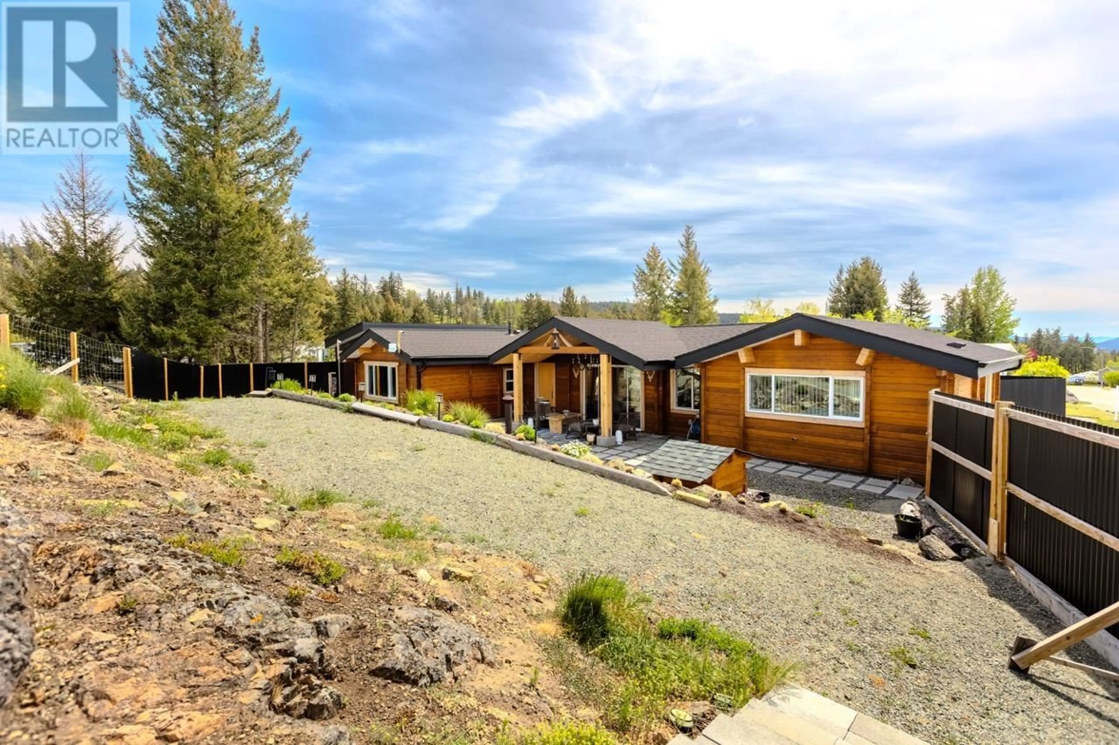 A pic from outside/outdoor area/front of a property/back of a property/a pic from drone, mountain view for 129 TOPAZ CRESCENT, Logan Lake British Columbia V0K1W0