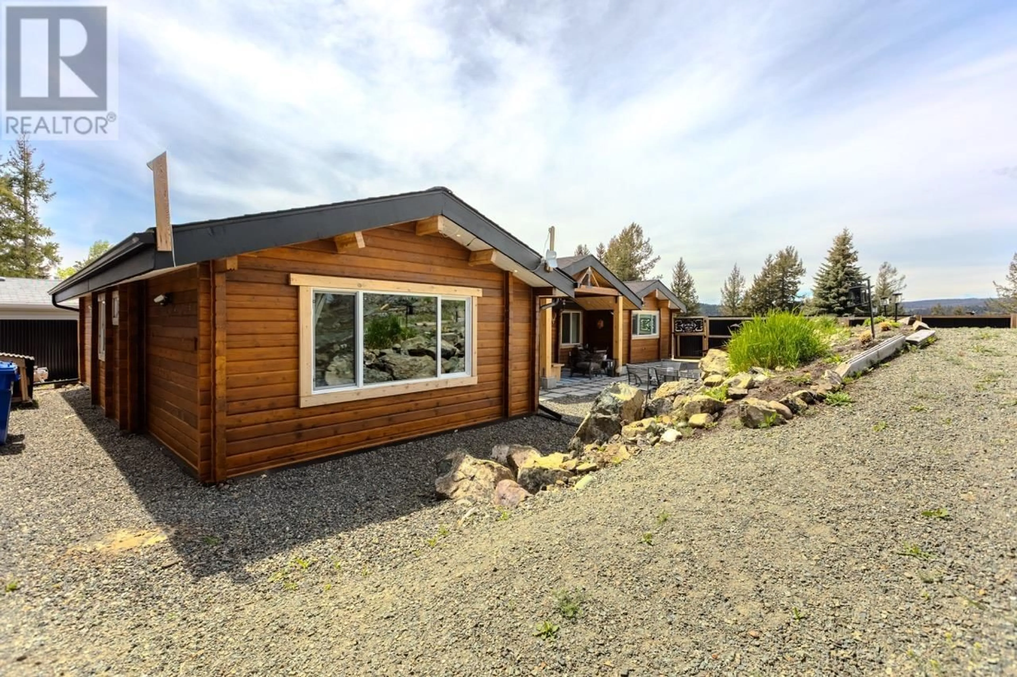 Home with vinyl exterior material, street for 129 TOPAZ CRESCENT, Logan Lake British Columbia V0K1W0