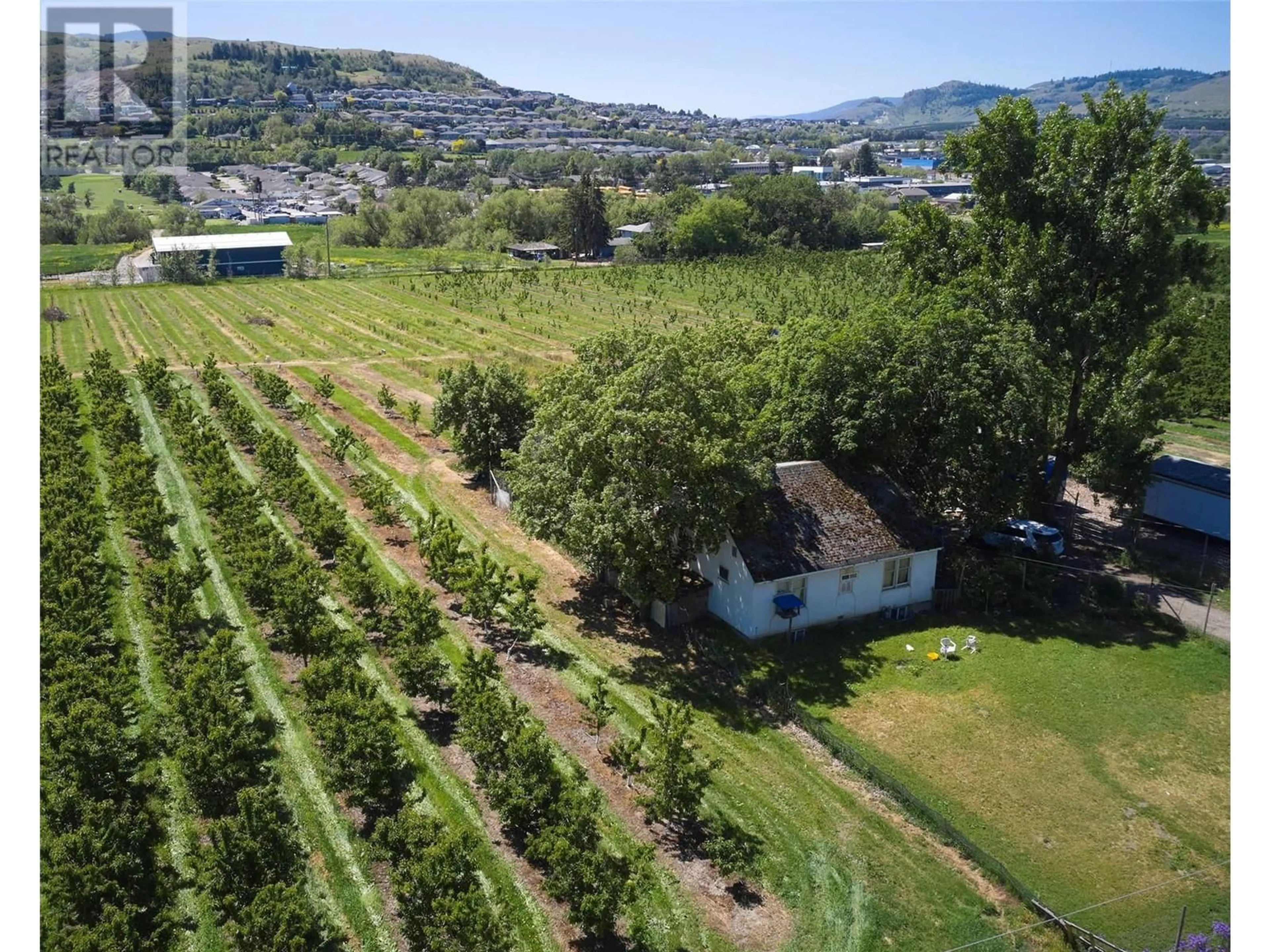 A pic from outside/outdoor area/front of a property/back of a property/a pic from drone, mountain view for 1094 POTTERY ROAD, Vernon British Columbia V1B3A5