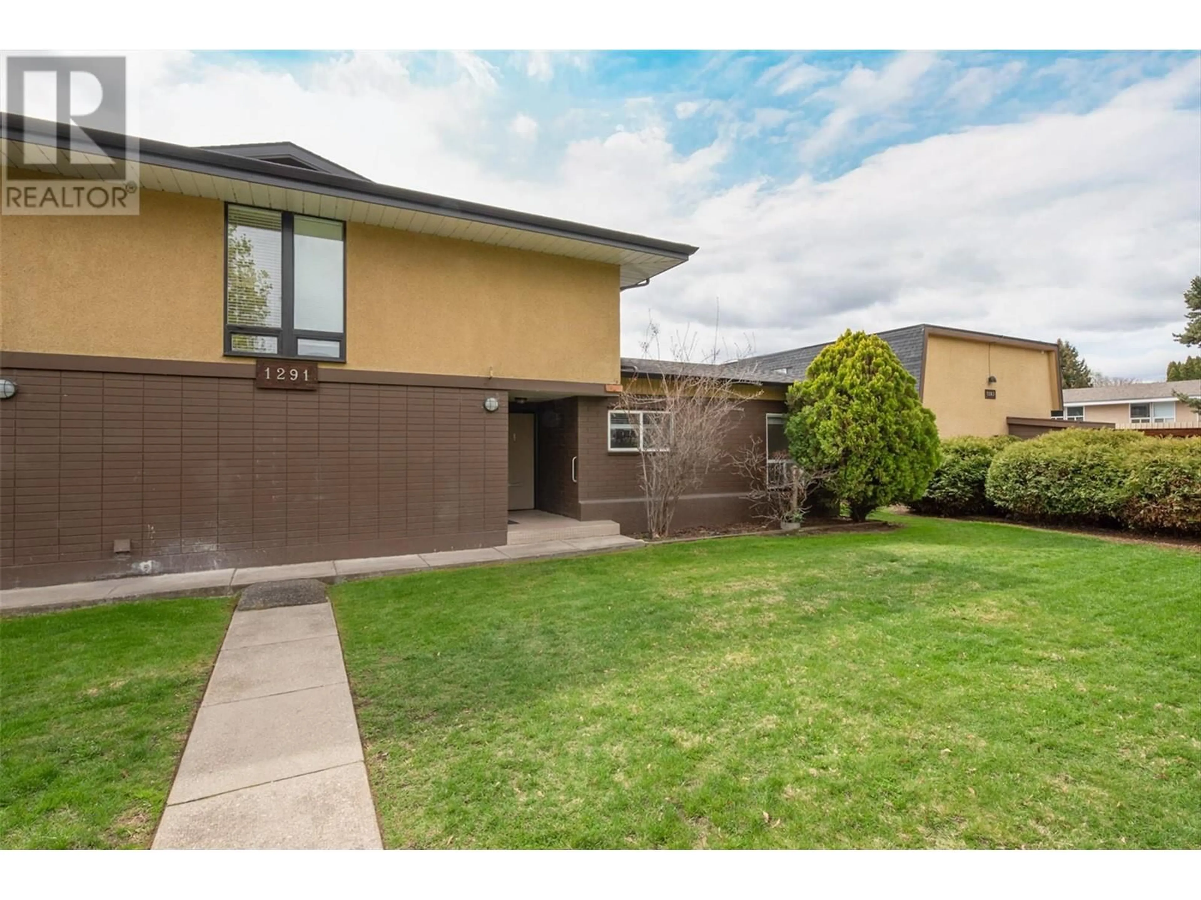 A pic from outside/outdoor area/front of a property/back of a property/a pic from drone, street for 1 - 1291 BERNARD AVENUE, Kelowna British Columbia V1Y6R3