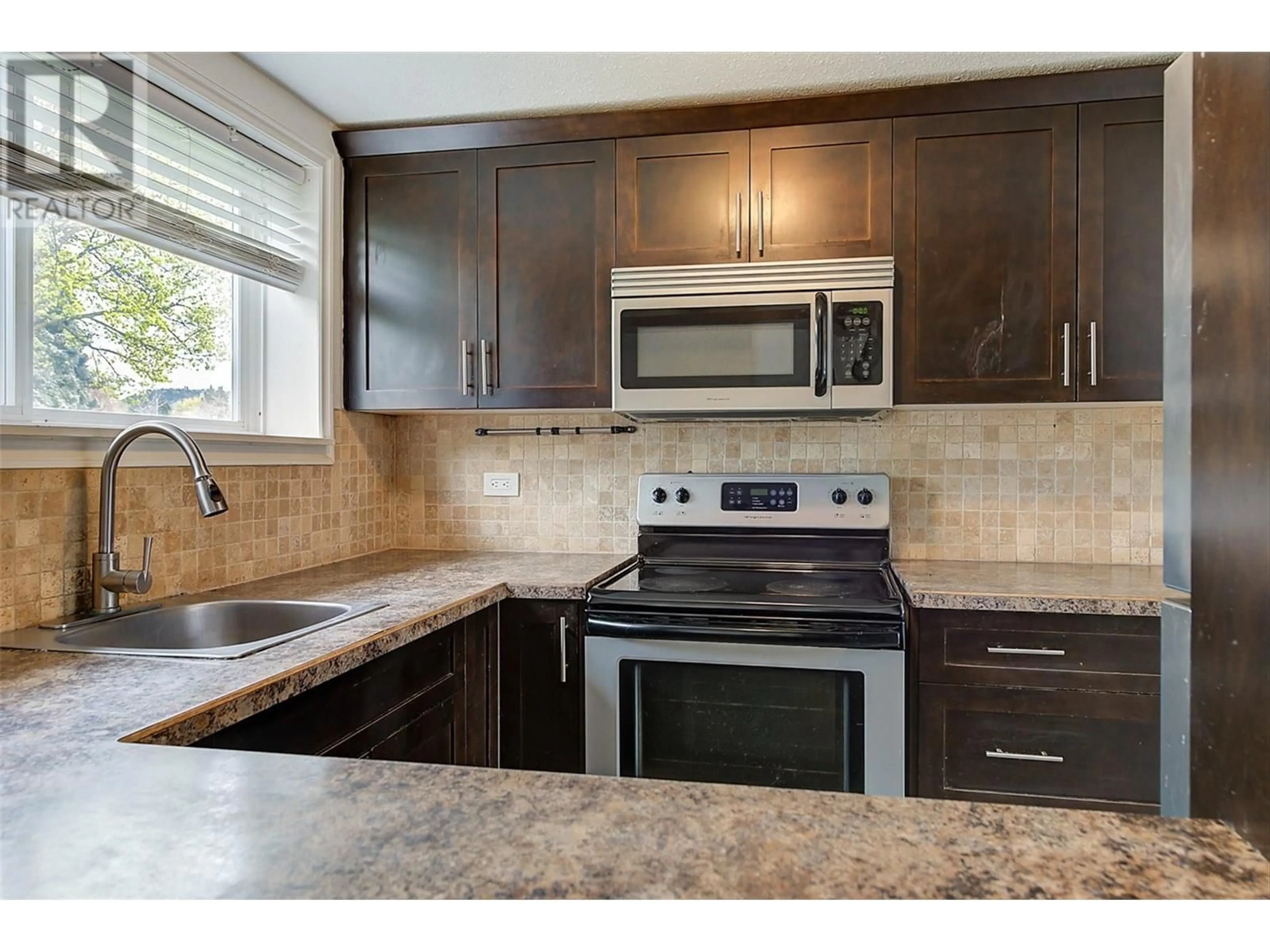 Standard kitchen, ceramic/tile floor for 1 - 1291 BERNARD AVENUE, Kelowna British Columbia V1Y6R3