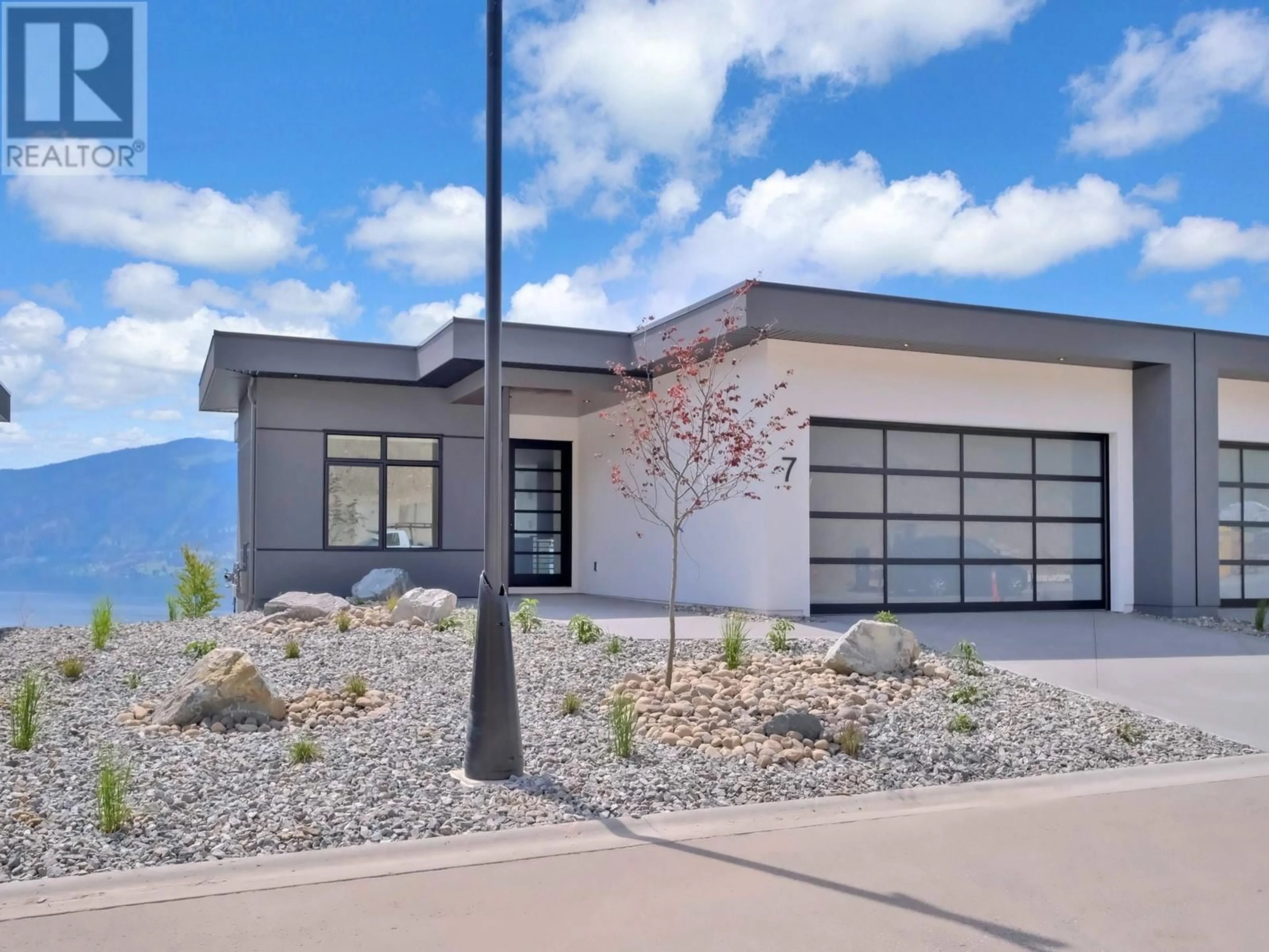 Home with vinyl exterior material, mountain view for 7 - 9201 OKANAGAN CENTRE ROAD WEST, Lake Country British Columbia V4V0B8
