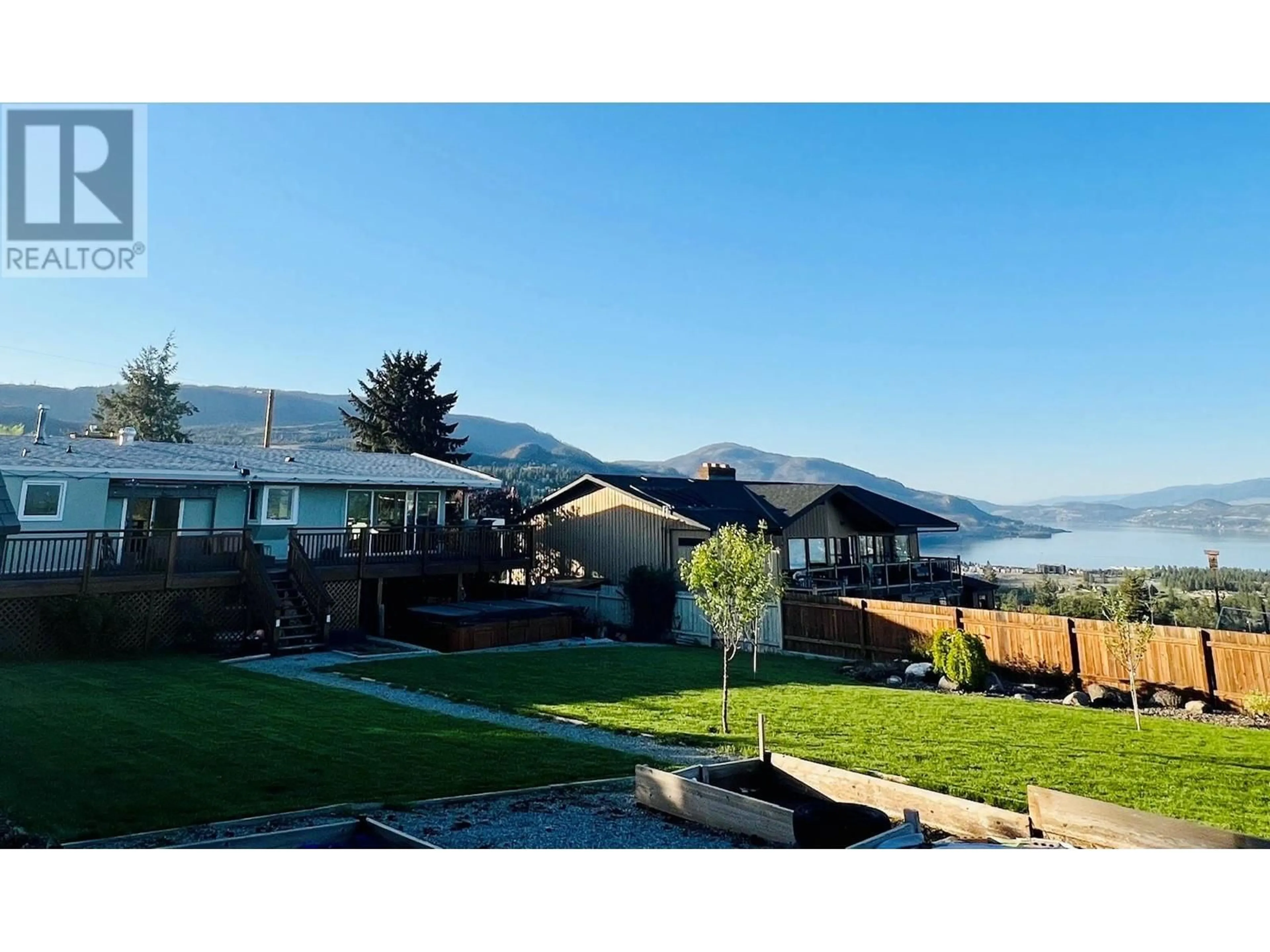 A pic from outside/outdoor area/front of a property/back of a property/a pic from drone, mountain view for 2415 COLLINGWOOD ROAD, West Kelowna British Columbia V1Z2C3