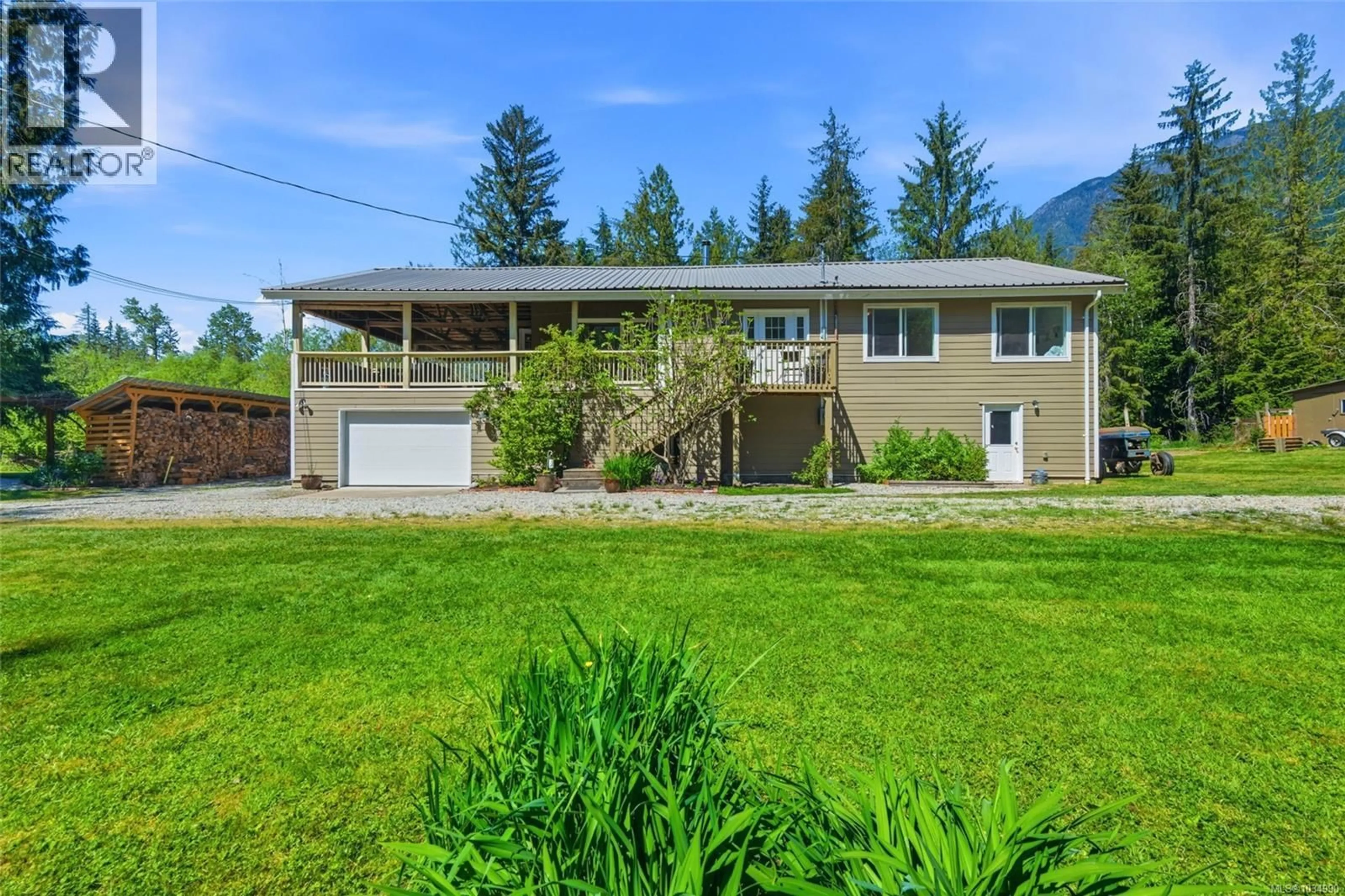 A pic from outside/outdoor area/front of a property/back of a property/a pic from drone, mountain view for 8445 MESHERS ROAD, Port Alberni British Columbia V9Y8N5