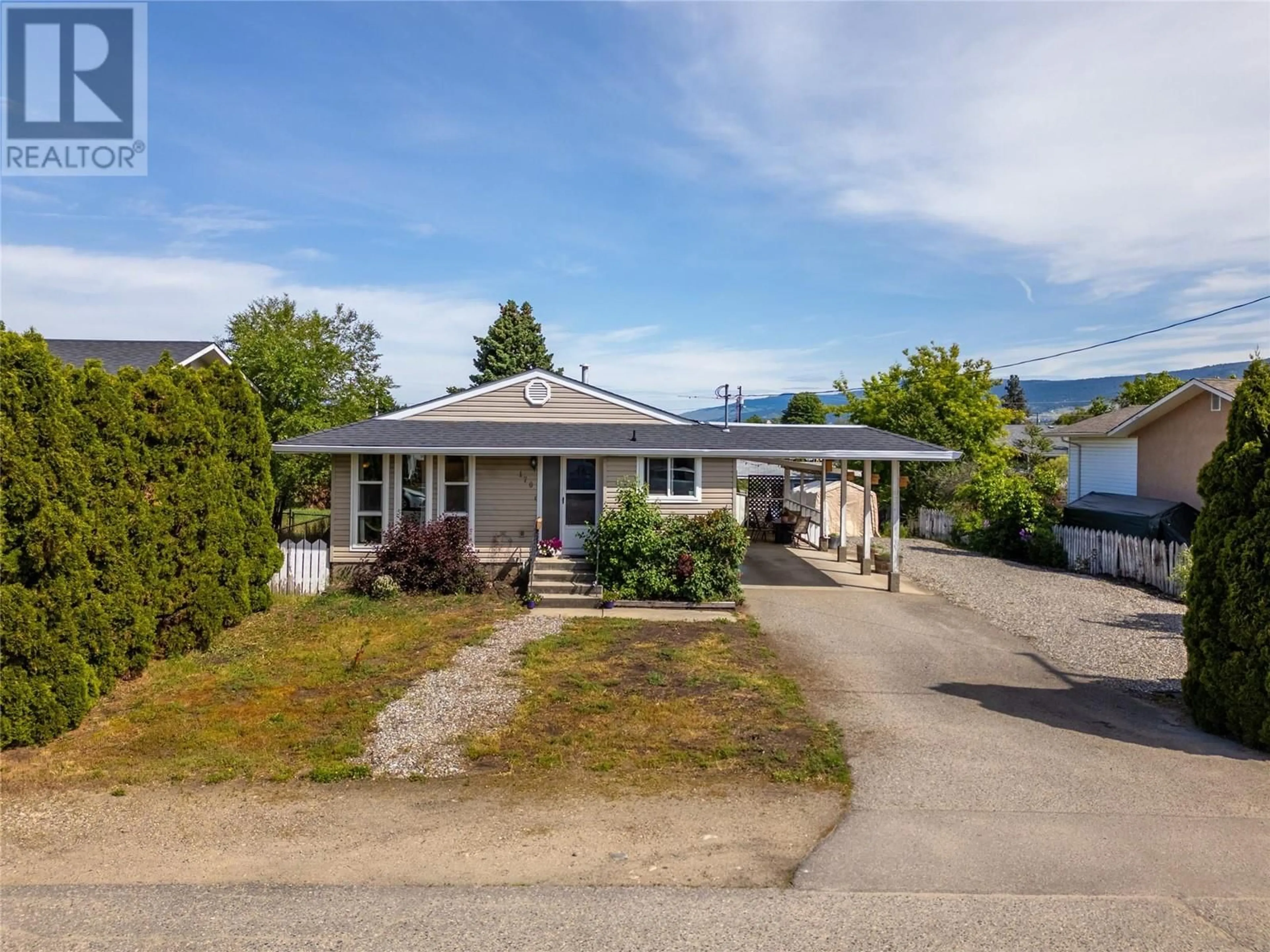 A pic from outside/outdoor area/front of a property/back of a property/a pic from drone, street for 170 MARS ROAD, Kelowna British Columbia V1X1H2