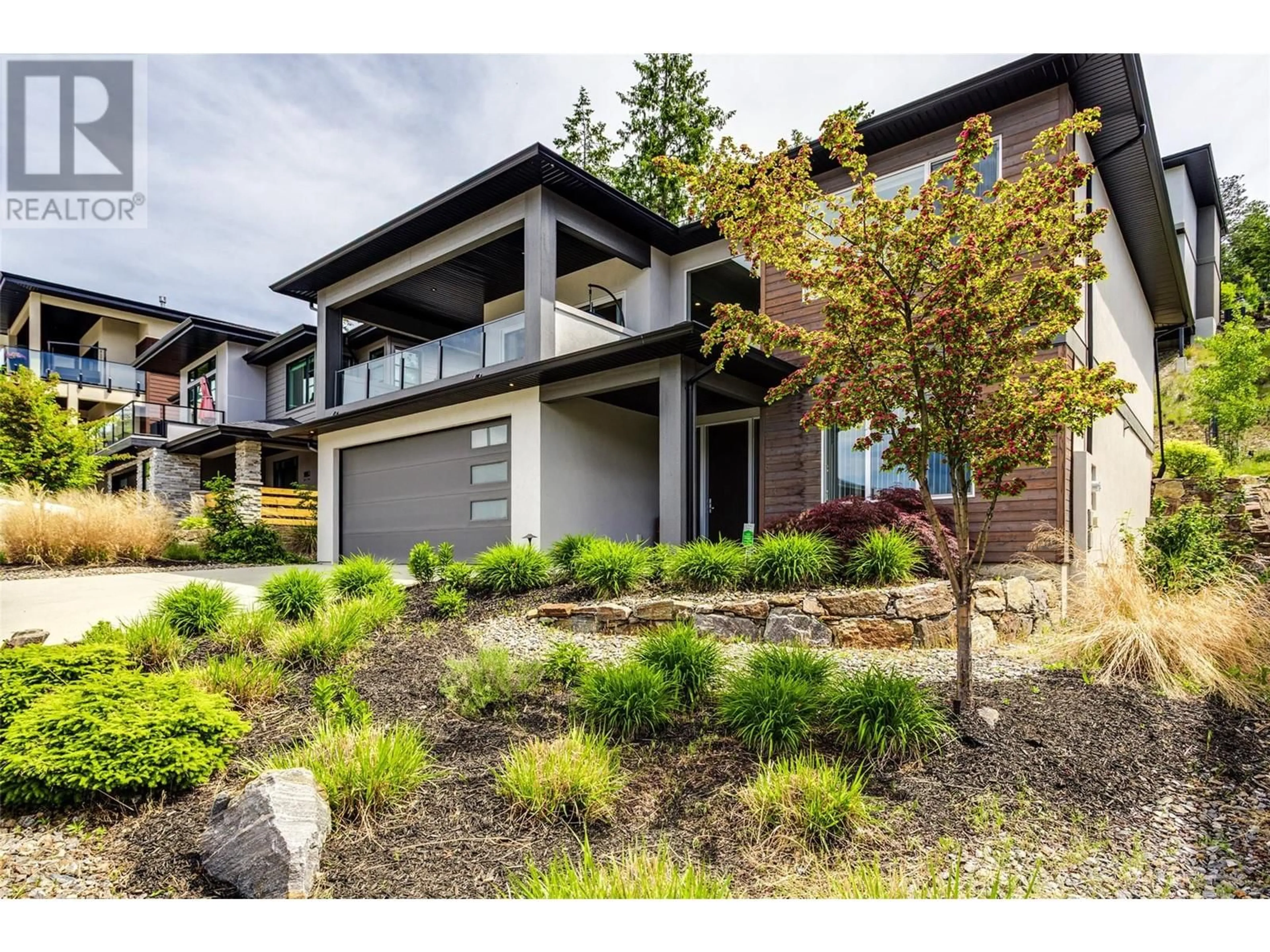 Home with brick exterior material, street for 3411 WATER BIRCH CIRCLE CIRCLE, Kelowna British Columbia V1V3G1