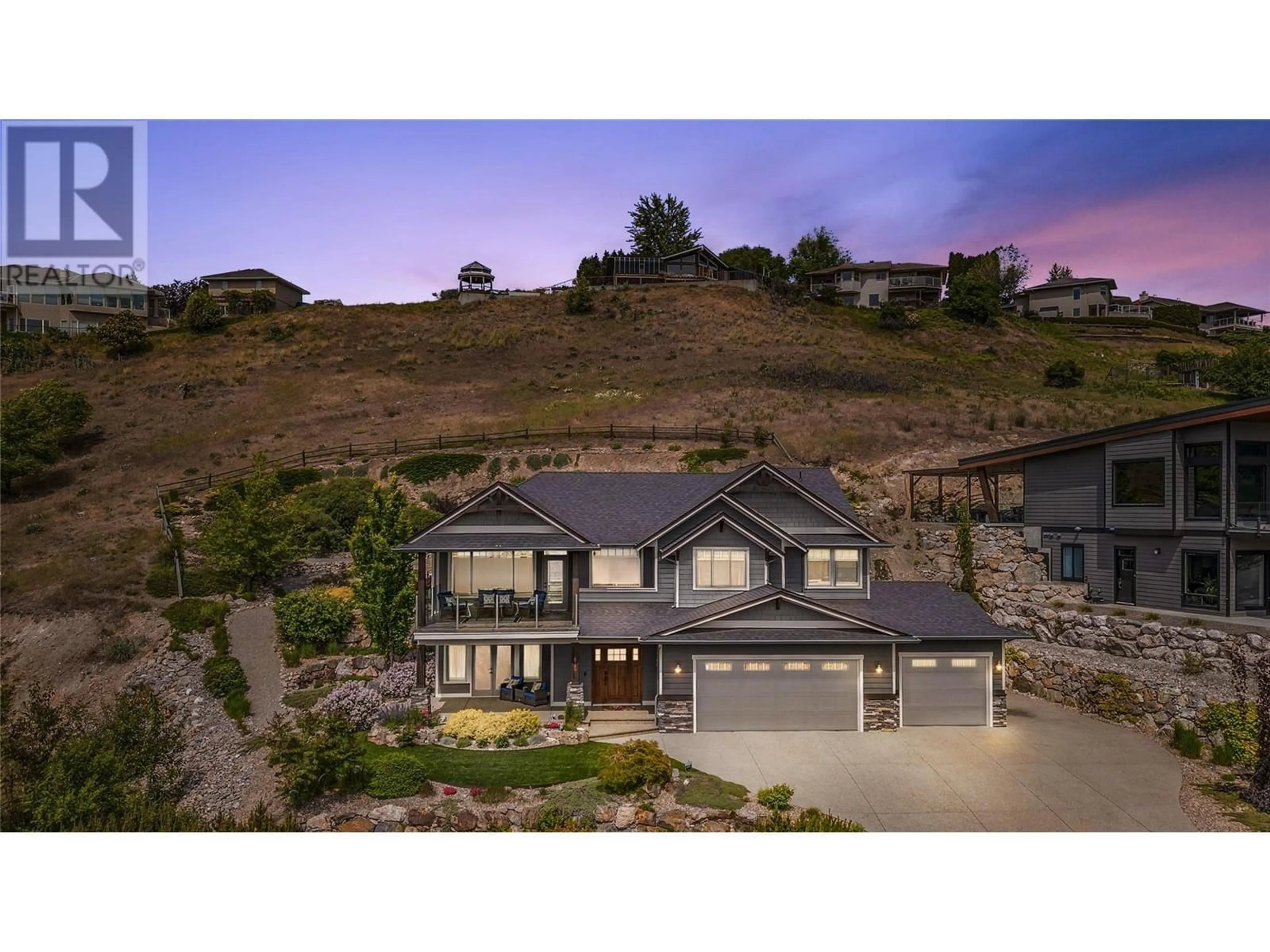 A pic from outside/outdoor area/front of a property/back of a property/a pic from drone, mountain view for 8780 BRAEBURN DRIVE, Coldstream British Columbia V1B4E5