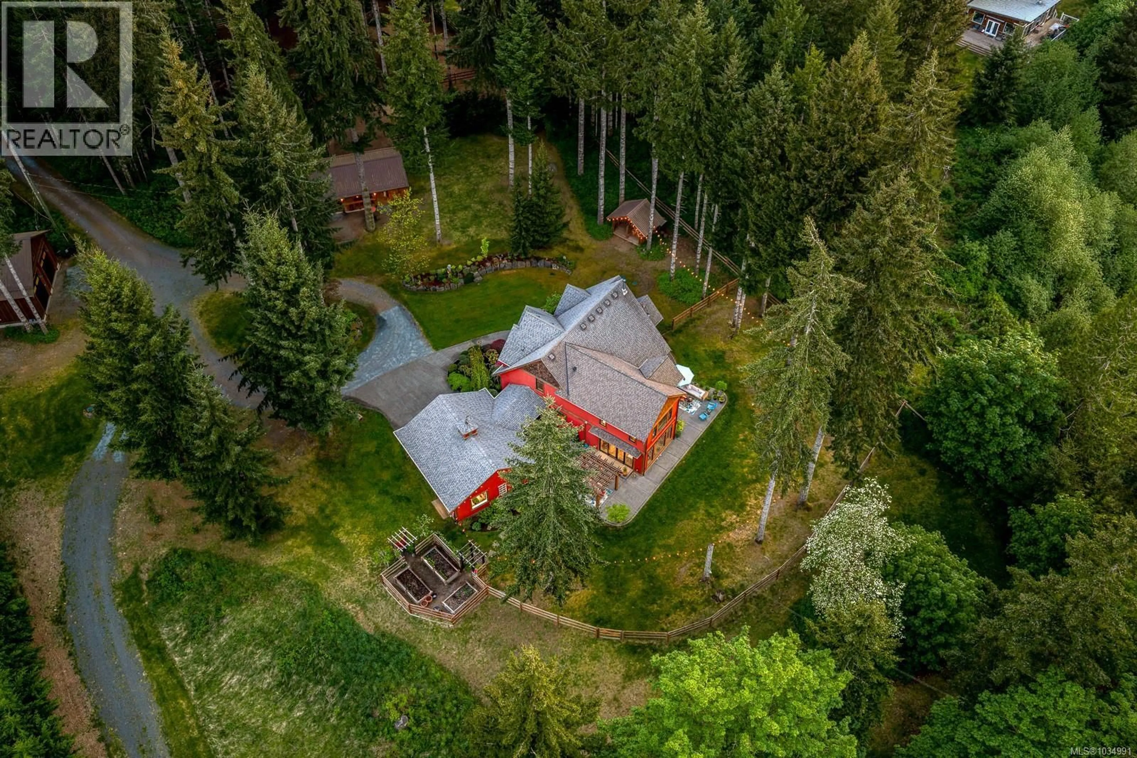 A pic from outside/outdoor area/front of a property/back of a property/a pic from drone, forest/trees view for 9520 SARMMA ROAD, Black Creek British Columbia V9J1Y9
