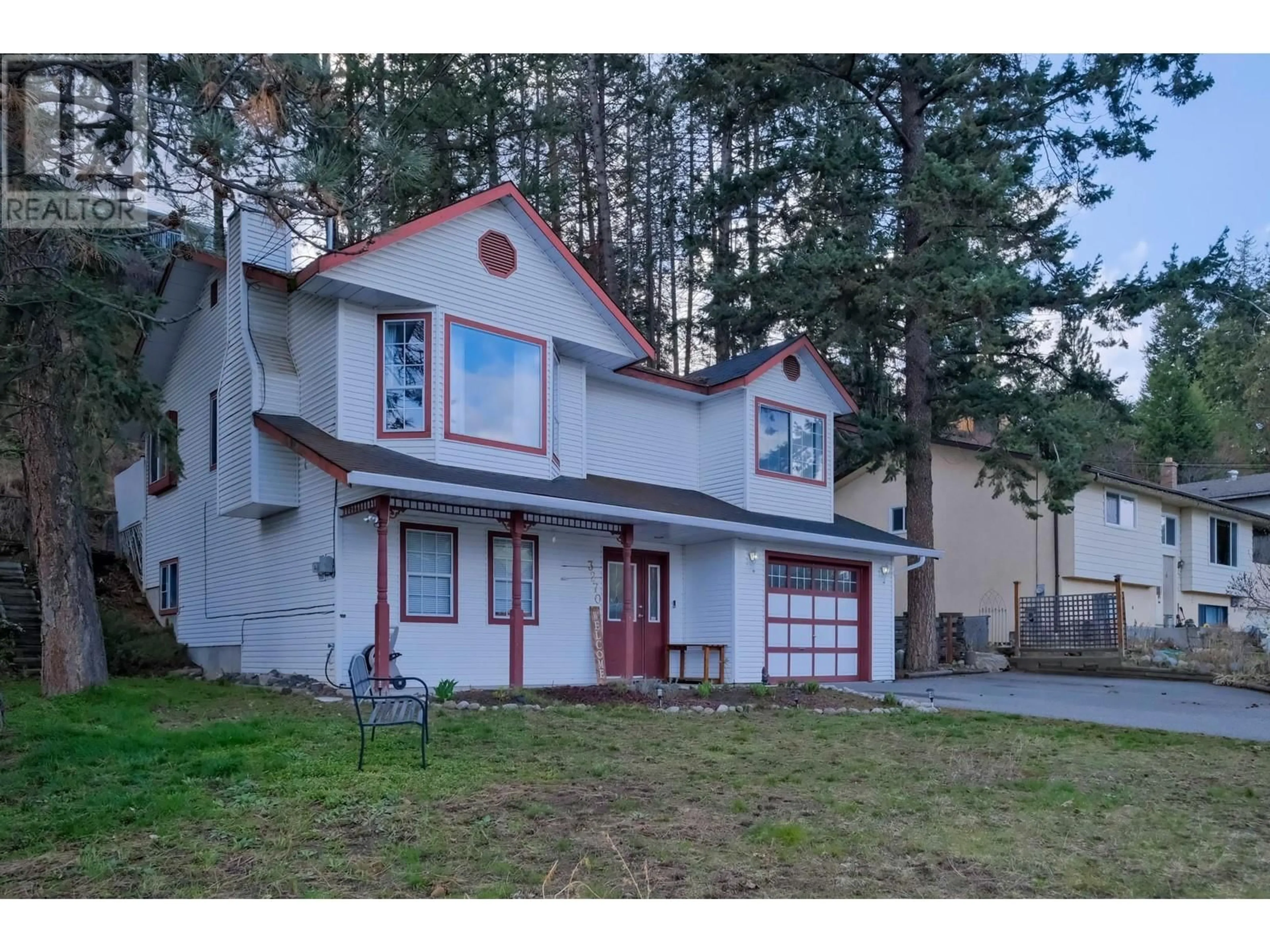 Home with vinyl exterior material, street for 3270 MCGINNIS ROAD, West Kelowna British Columbia V4T1A9