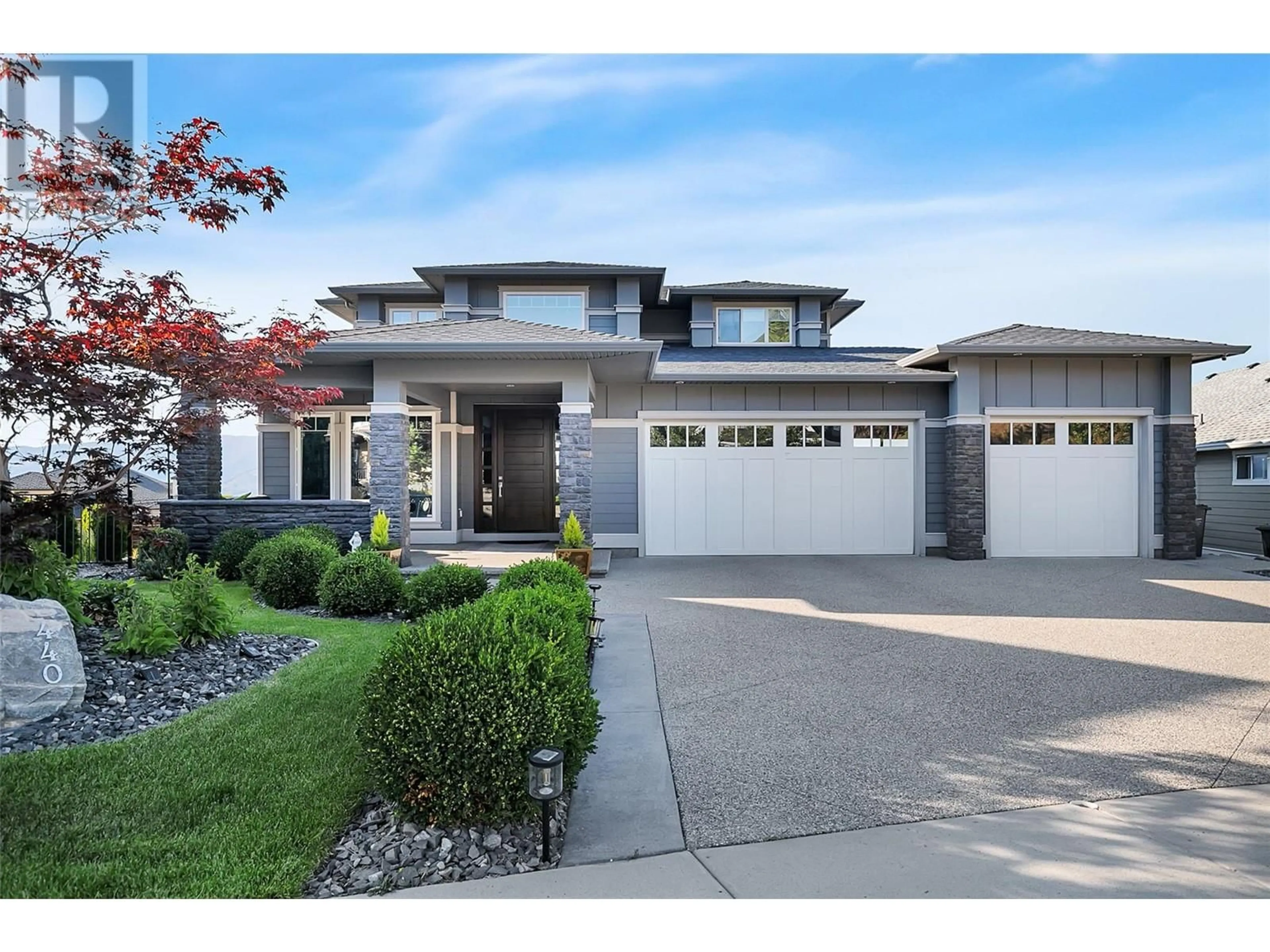 Home with brick exterior material, street for 440 AUDUBON COURT, Kelowna British Columbia V1W5K3