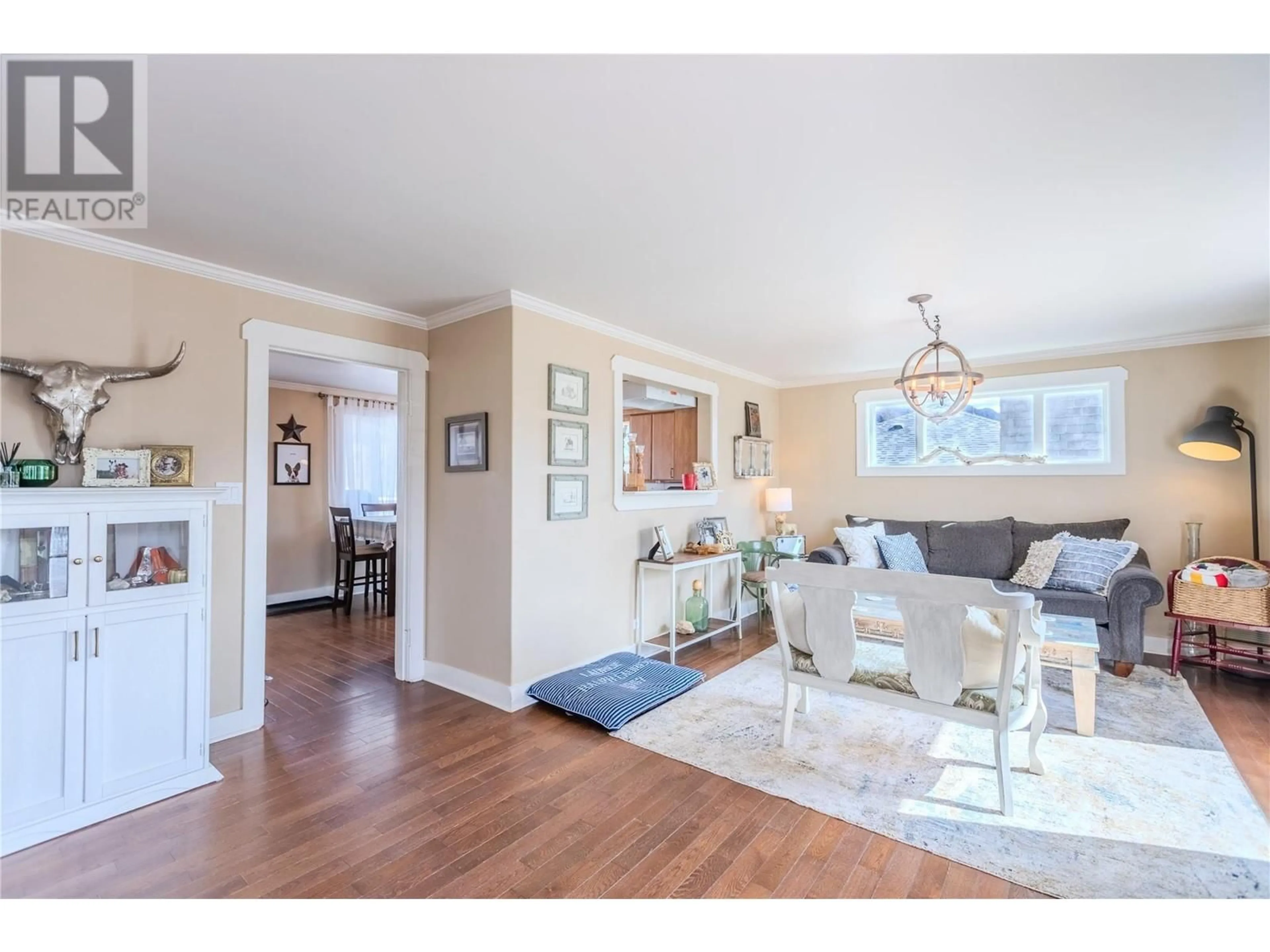 Living room with furniture, wood/laminate floor for 233 BIRCH AVENUE, Kamloops British Columbia V2B0B5
