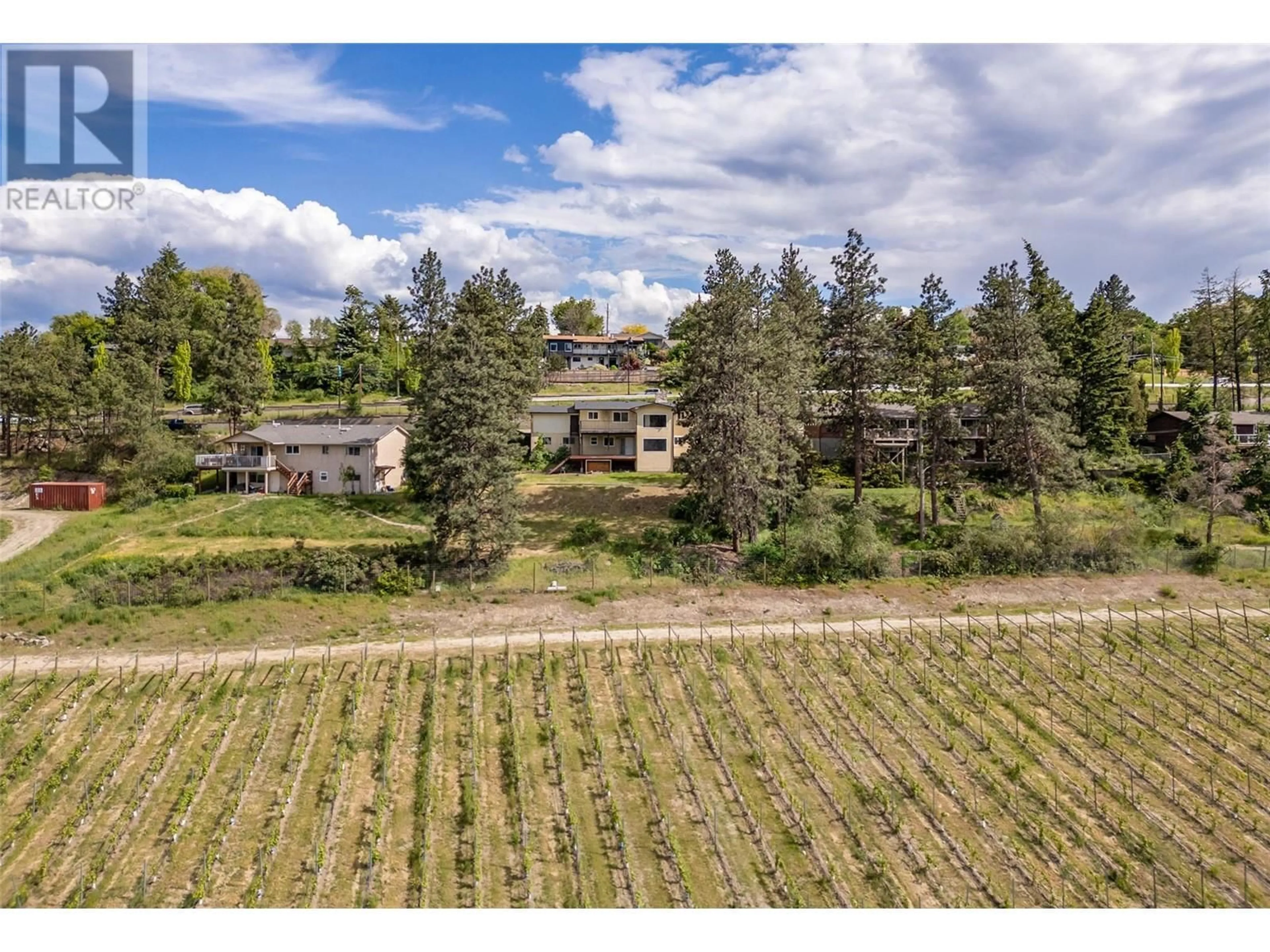 A pic from outside/outdoor area/front of a property/back of a property/a pic from drone, unknown for 2370 BOUCHERIE ROAD, West Kelowna British Columbia V1Z2E6
