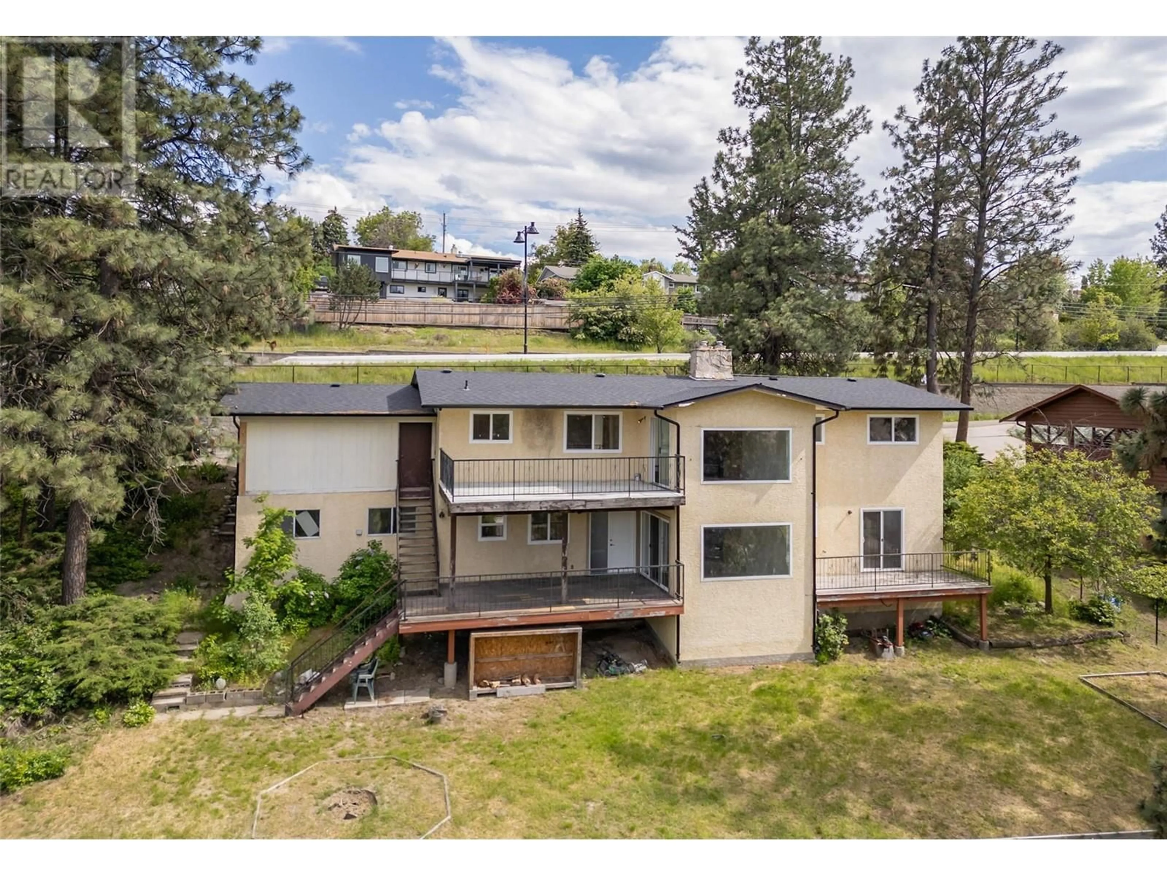 A pic from outside/outdoor area/front of a property/back of a property/a pic from drone, mountain view for 2370 BOUCHERIE ROAD, West Kelowna British Columbia V1Z2E6