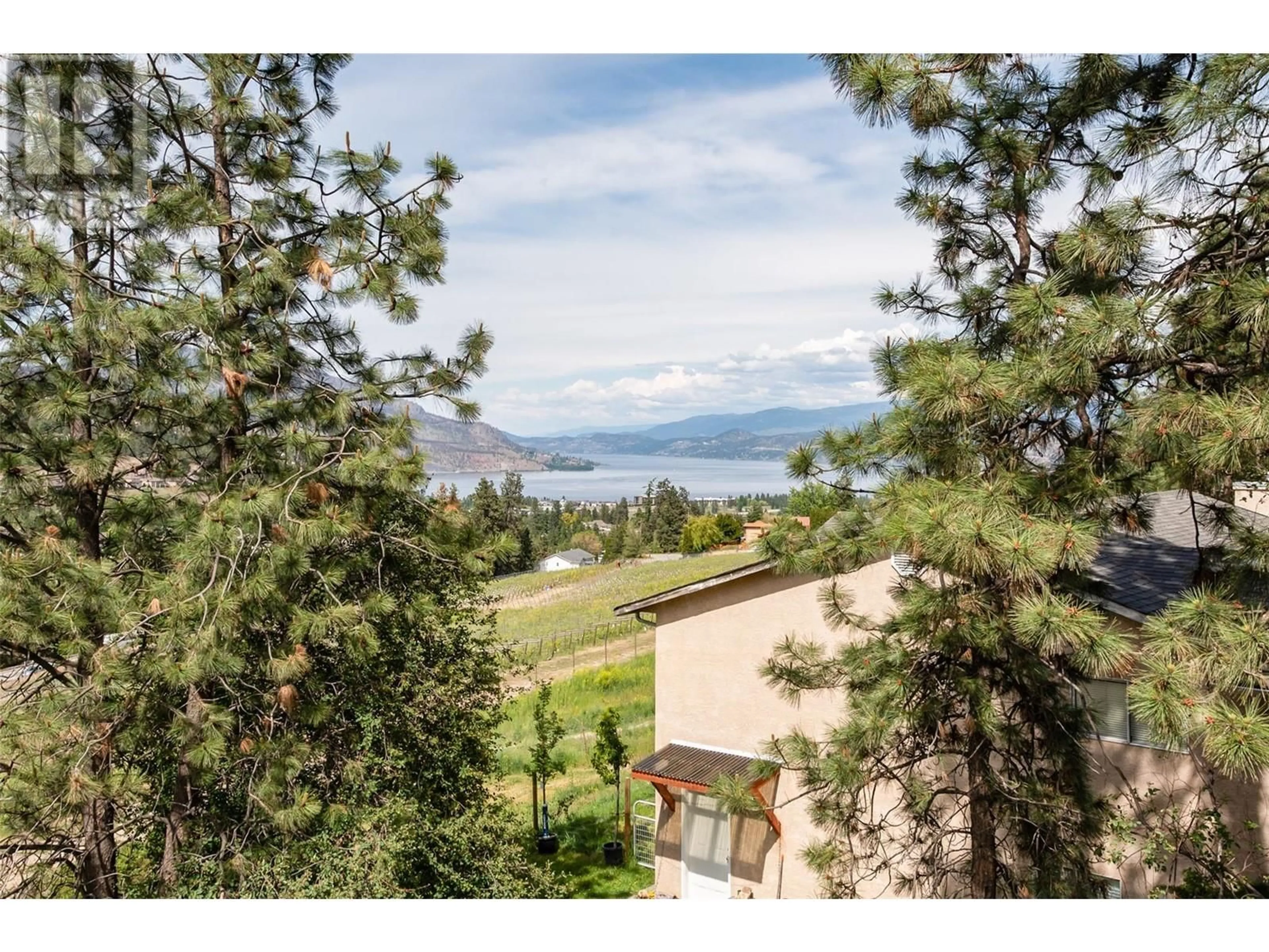 A pic from outside/outdoor area/front of a property/back of a property/a pic from drone, water/lake/river/ocean view for 2370 BOUCHERIE ROAD, West Kelowna British Columbia V1Z2E6