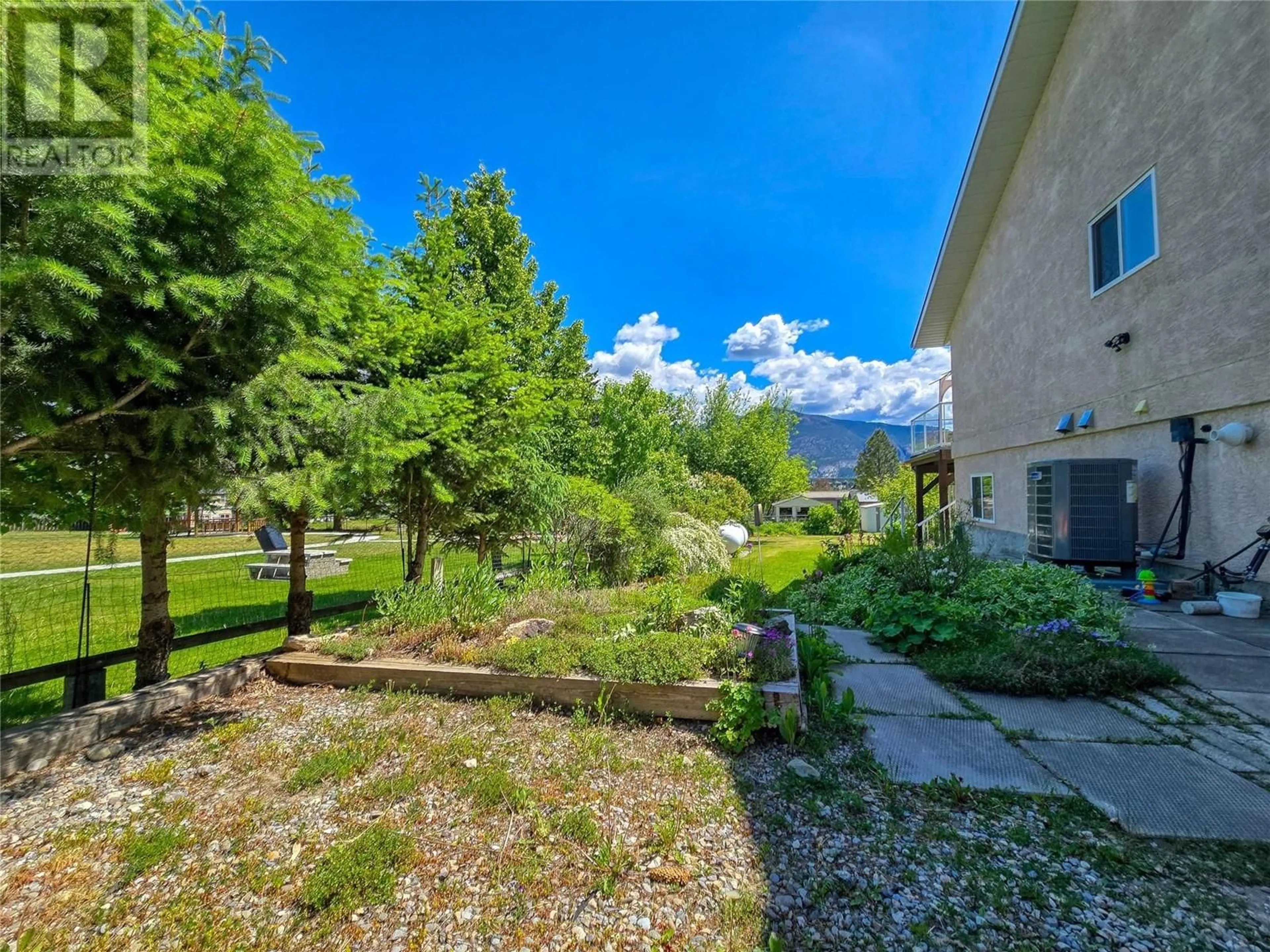A pic from outside/outdoor area/front of a property/back of a property/a pic from drone, mountain view for 817 12TH AVENUE, Invermere British Columbia V0A1K0