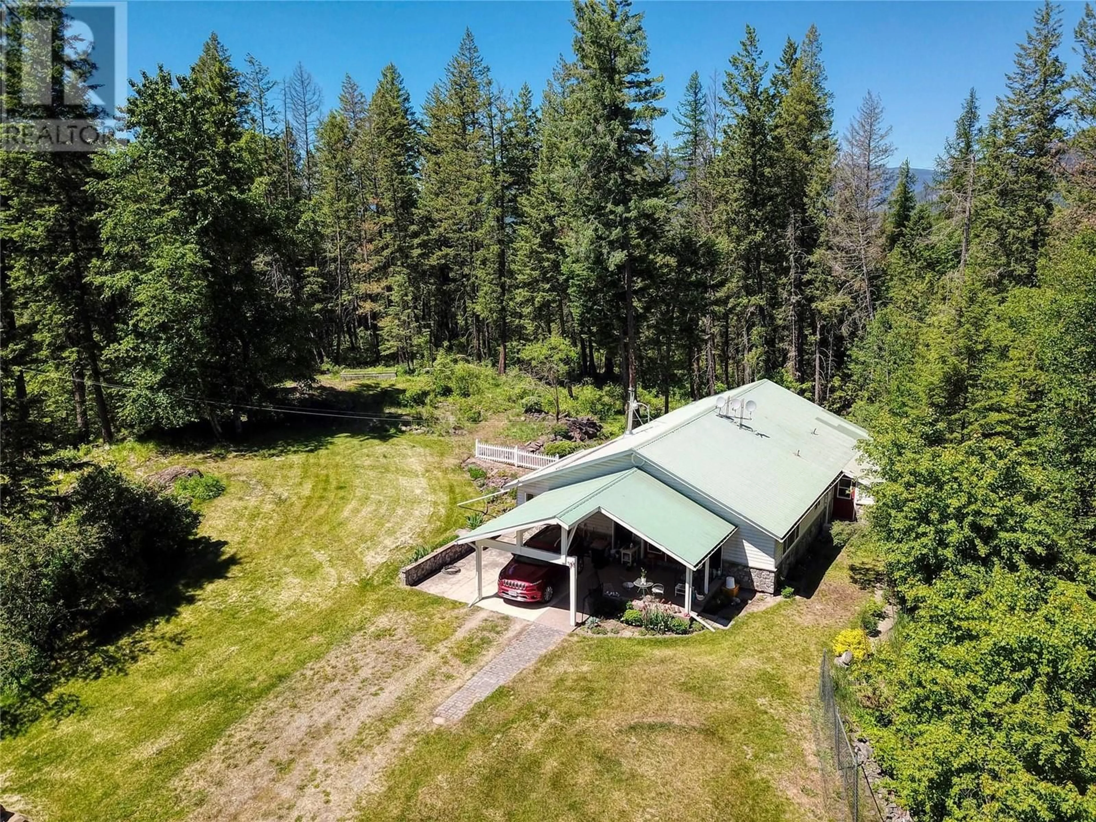 A pic from outside/outdoor area/front of a property/back of a property/a pic from drone, forest/trees view for 3320 JACKSON ROAD, Canyon British Columbia V0B1C1