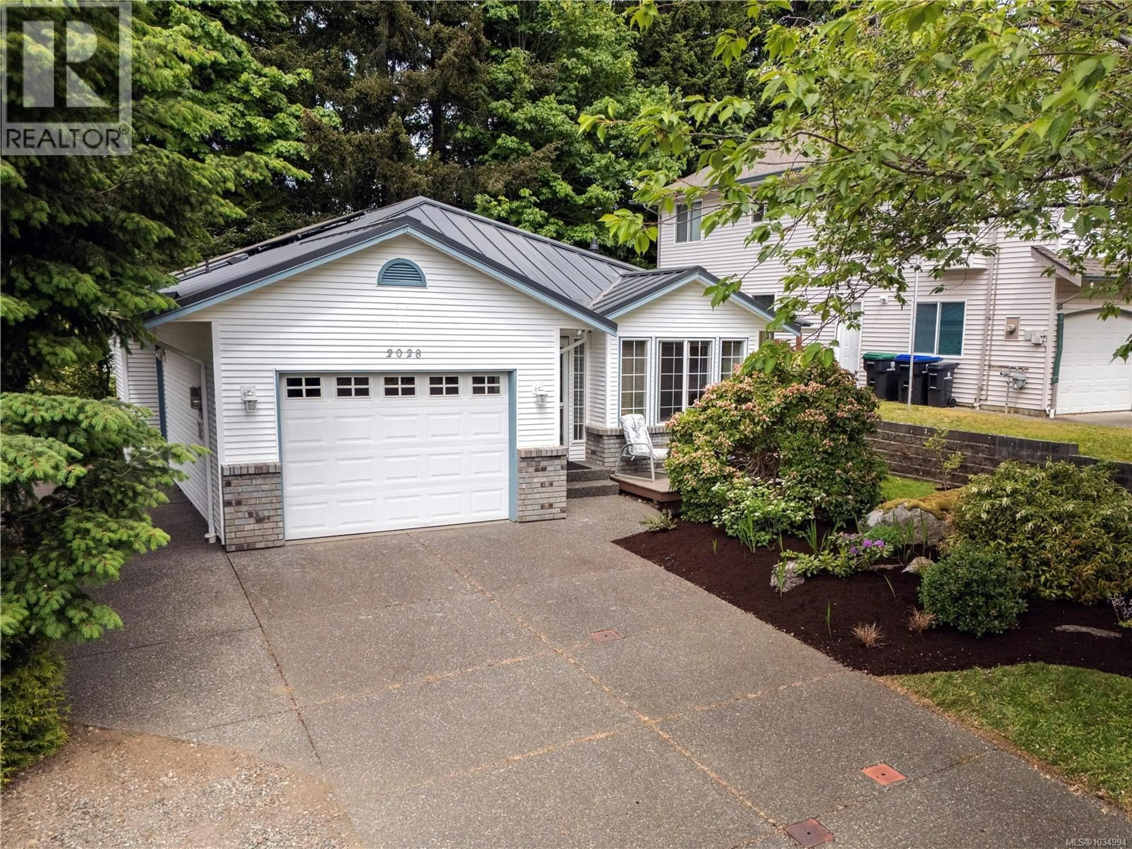 Home with vinyl exterior material, street for 2028 ANNA PLACE, Courtenay British Columbia V9N9B4
