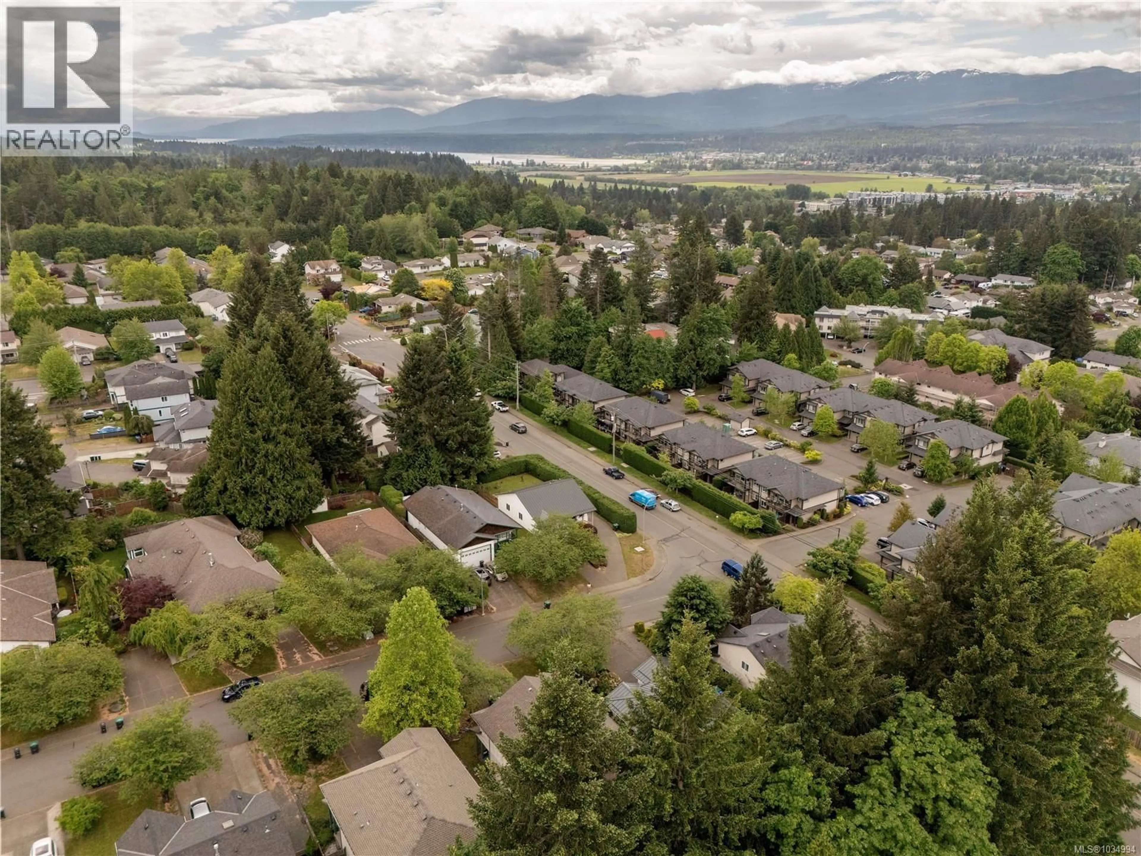 A pic from outside/outdoor area/front of a property/back of a property/a pic from drone, mountain view for 2028 ANNA PLACE, Courtenay British Columbia V9N9B4