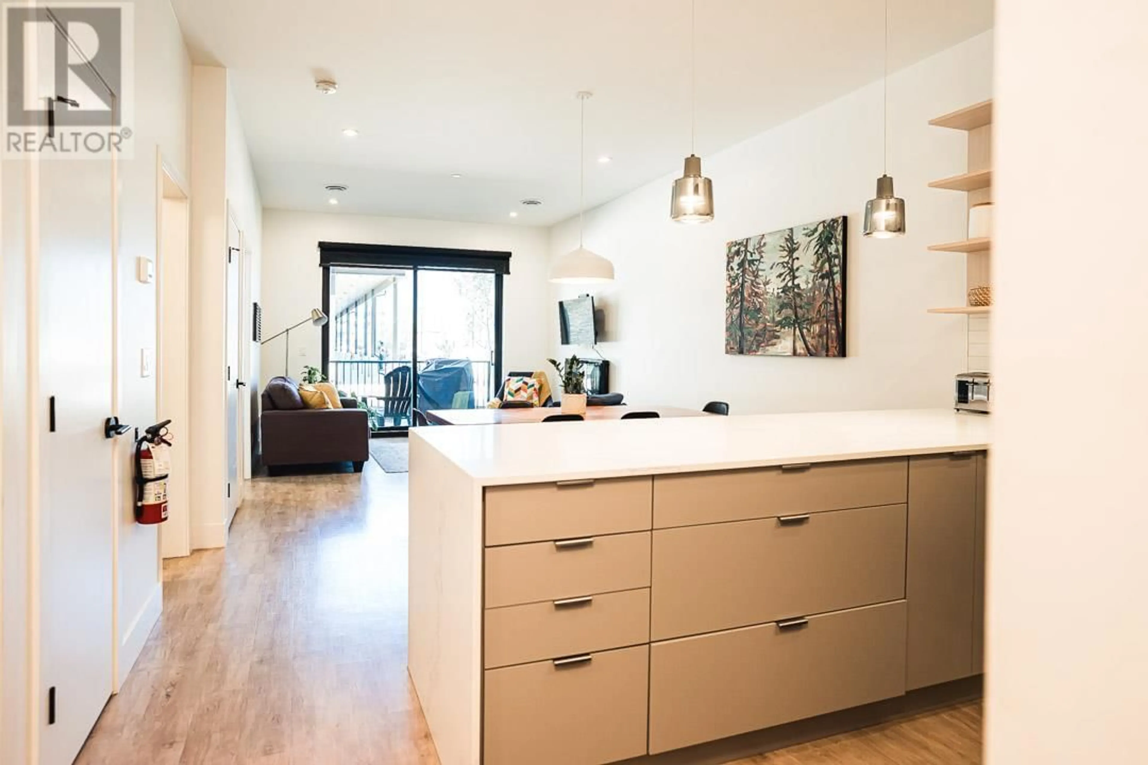 Contemporary kitchen, wood/laminate floor for 1105 - 1701 COURSIER AVENUE, Revelstoke British Columbia V0E2S3