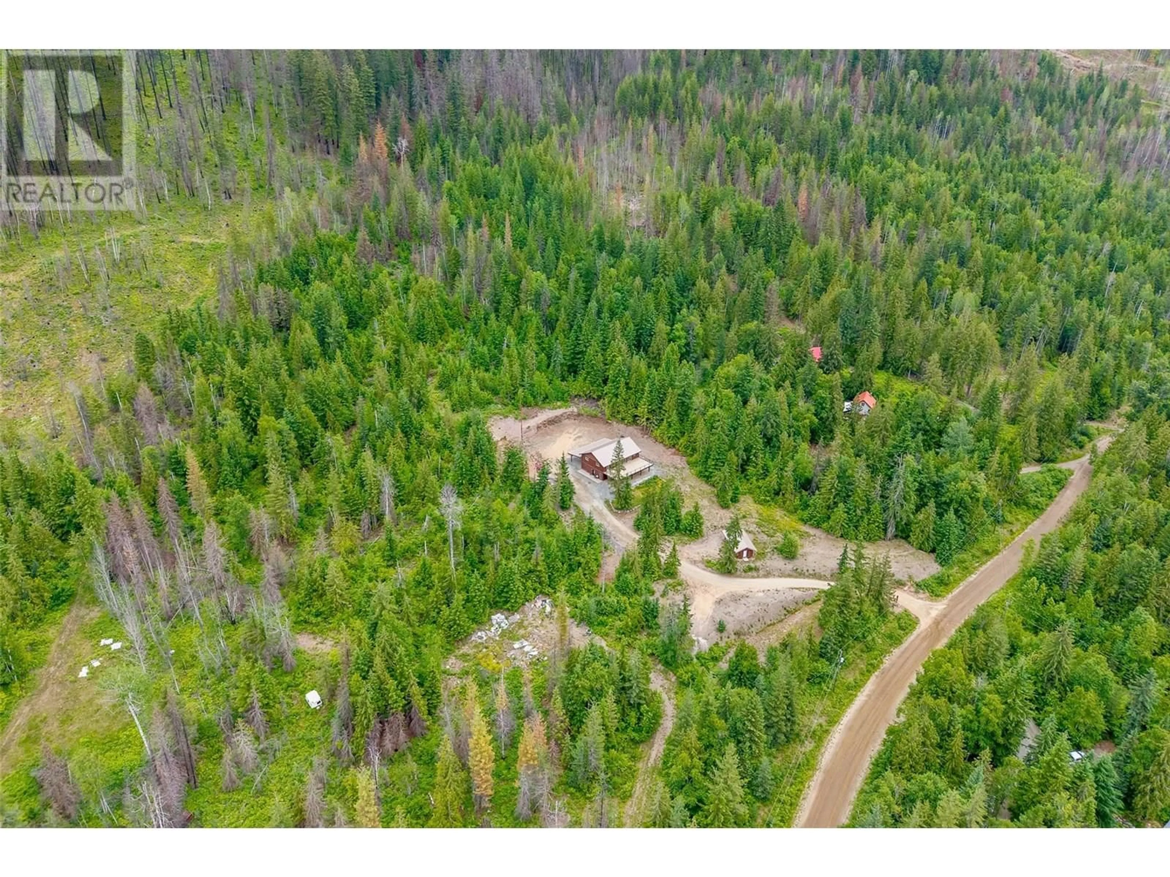 A pic from outside/outdoor area/front of a property/back of a property/a pic from drone, forest/trees view for 4141 MEADOW CREEK (FOREST SERVICE) ROAD, Celista British Columbia V0E1M6