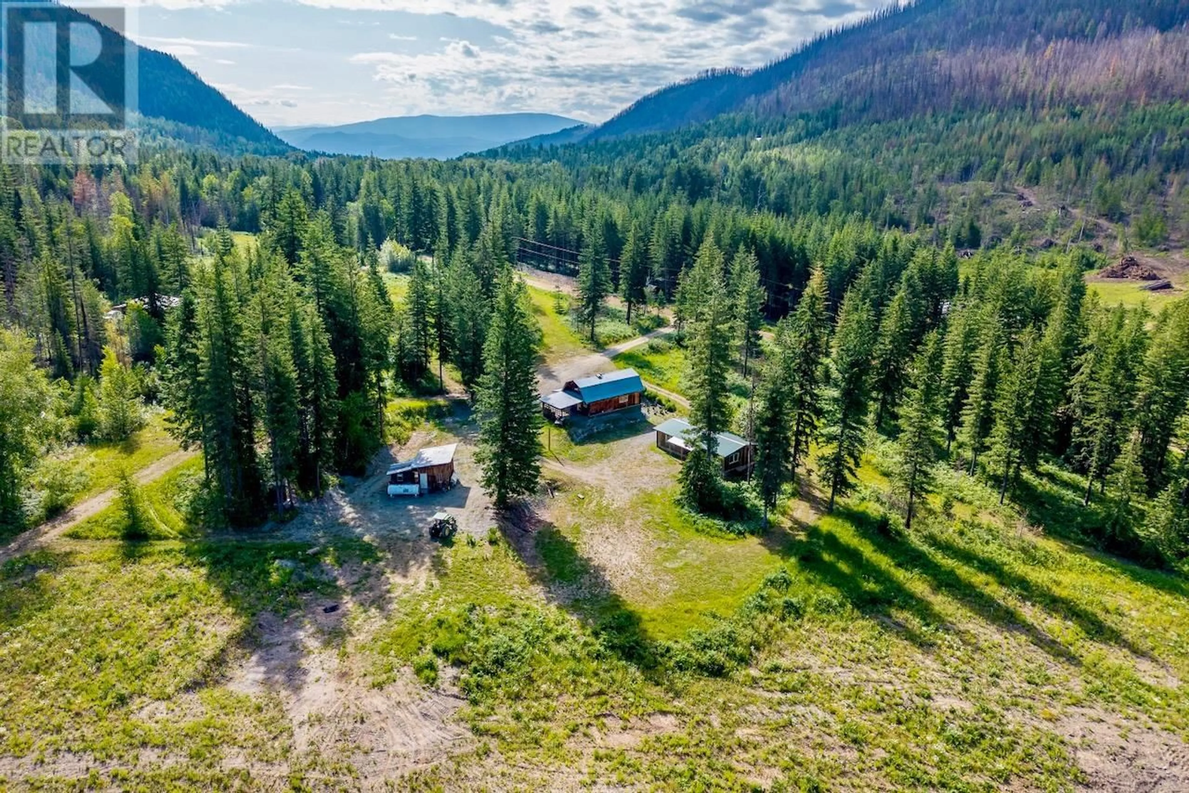 A pic from outside/outdoor area/front of a property/back of a property/a pic from drone, forest/trees view for 4053 MEADOW CREEK (FOREST SERVICE) ROAD, Celista British Columbia V0E1M6