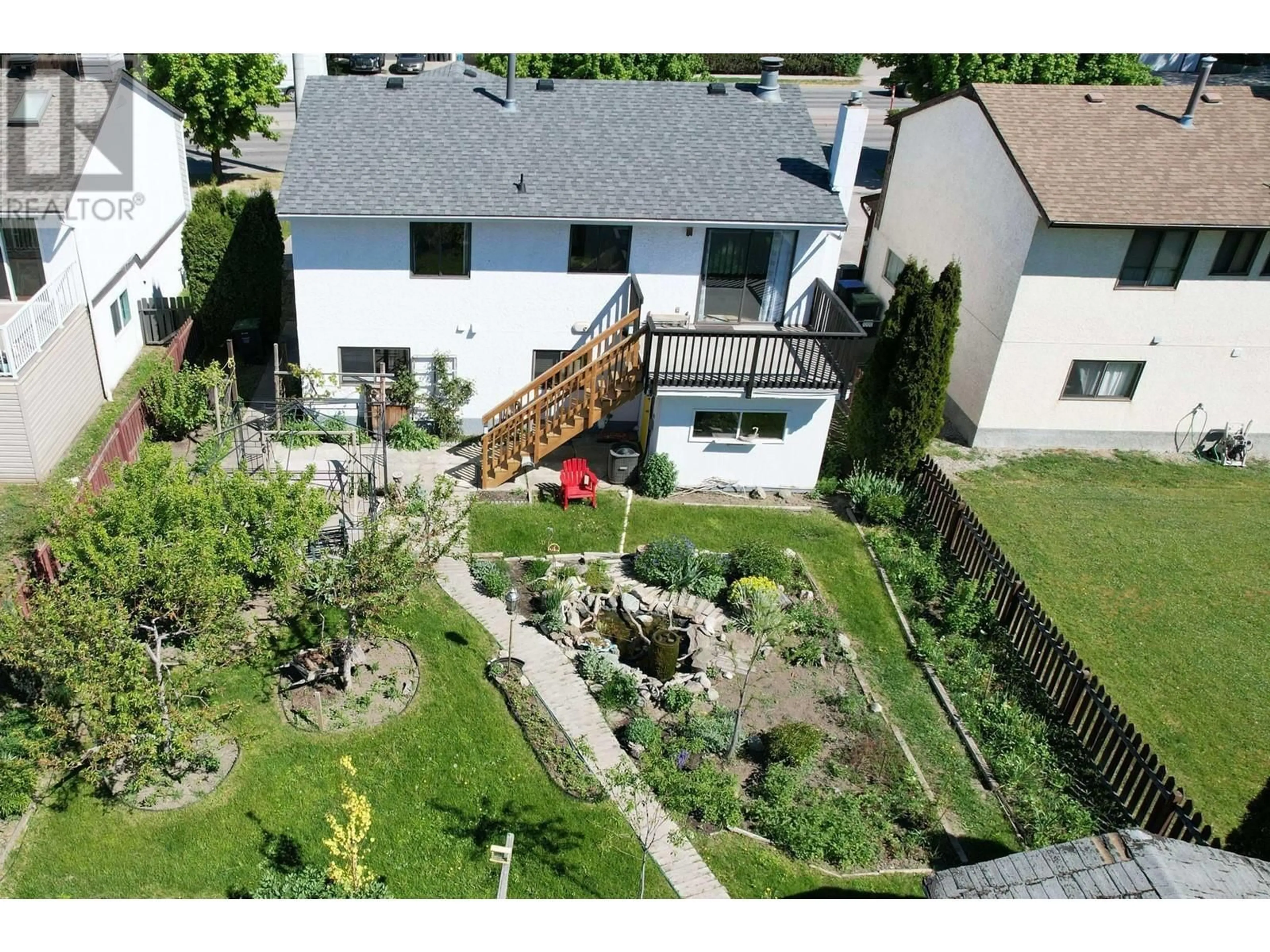 A pic from outside/outdoor area/front of a property/back of a property/a pic from drone, unknown for 1347 SPRINGFIELD ROAD, Kelowna British Columbia V1Y5V2