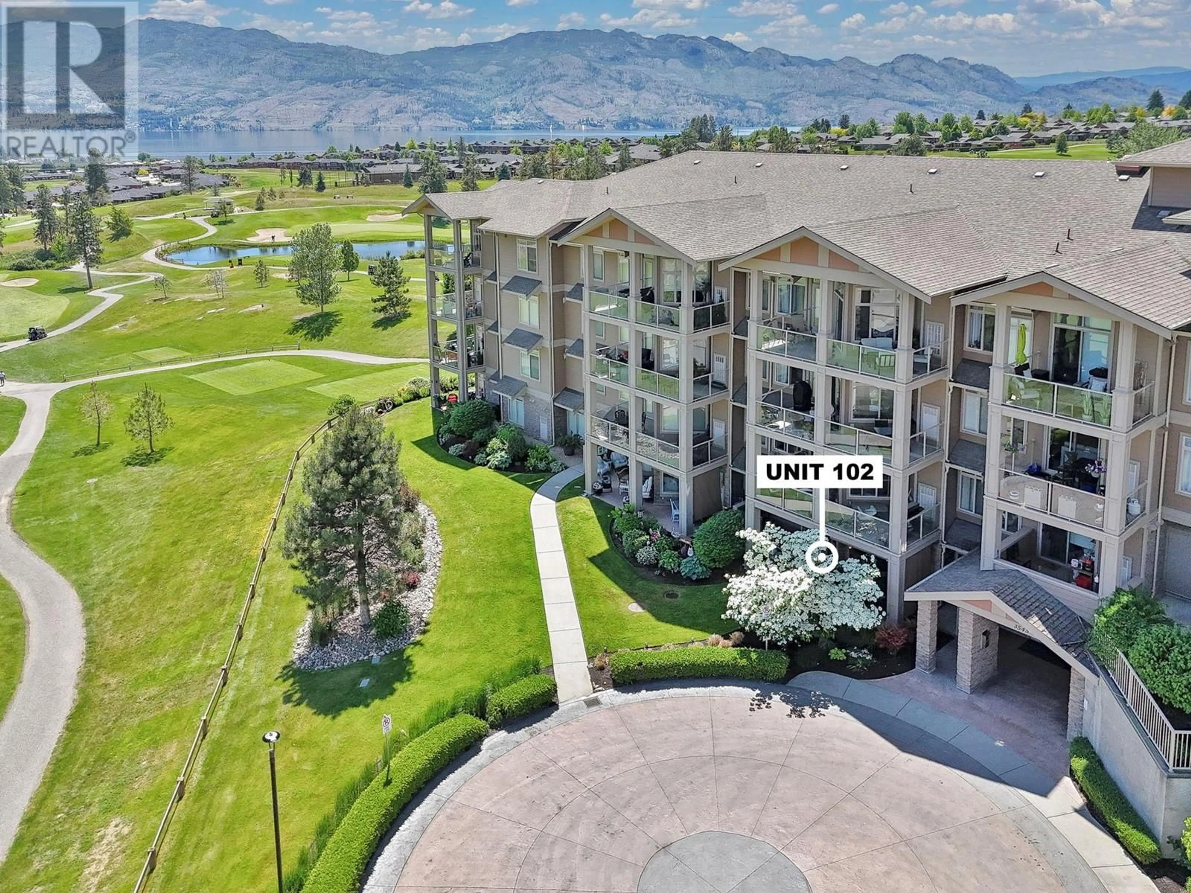A pic from outside/outdoor area/front of a property/back of a property/a pic from drone, mountain view for 102 - 3545 CARRINGTON ROAD, West Kelowna British Columbia V4T3A9