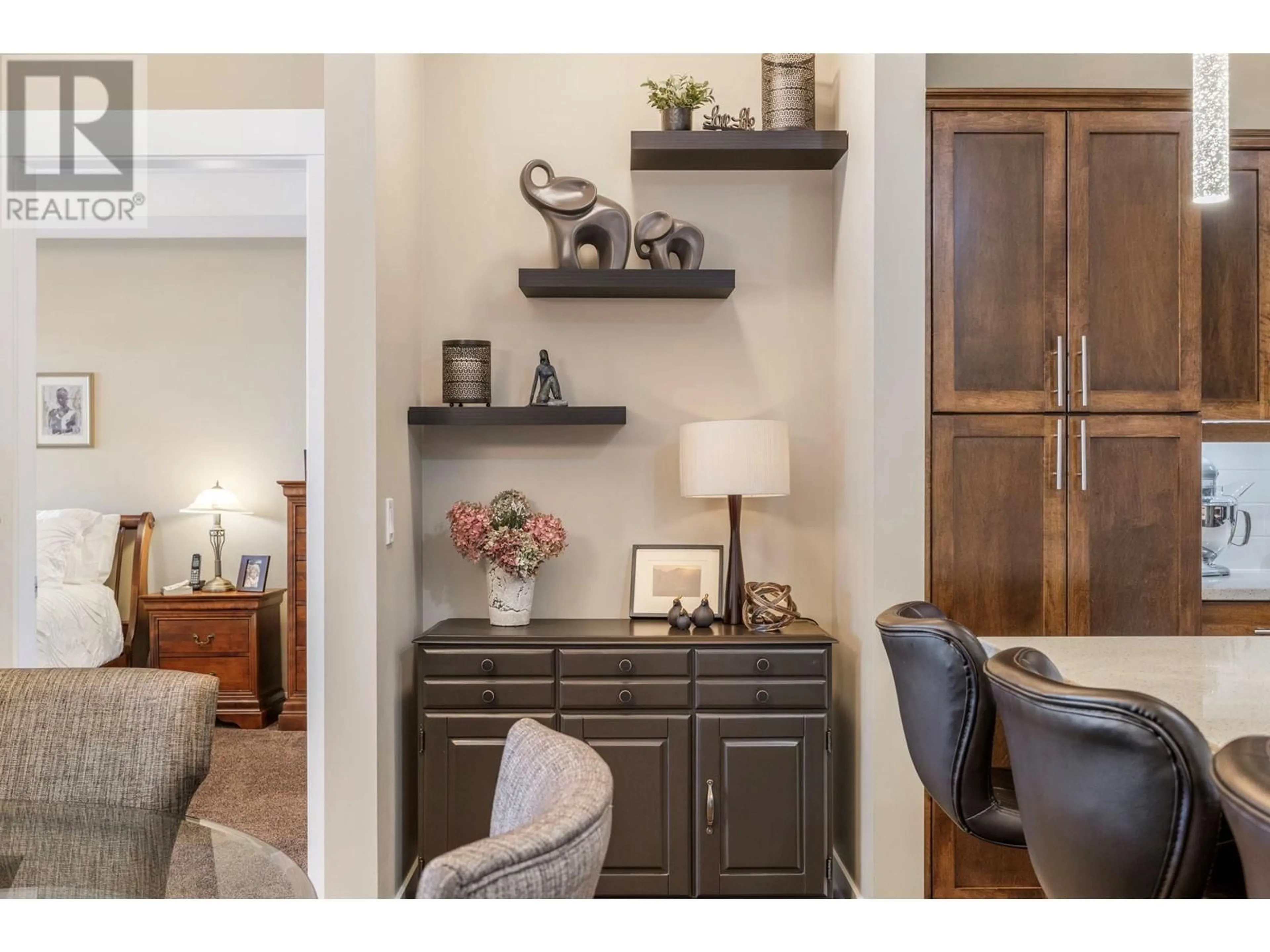 Open concept kitchen, wood/laminate floor for 102 - 3545 CARRINGTON ROAD, West Kelowna British Columbia V4T3A9