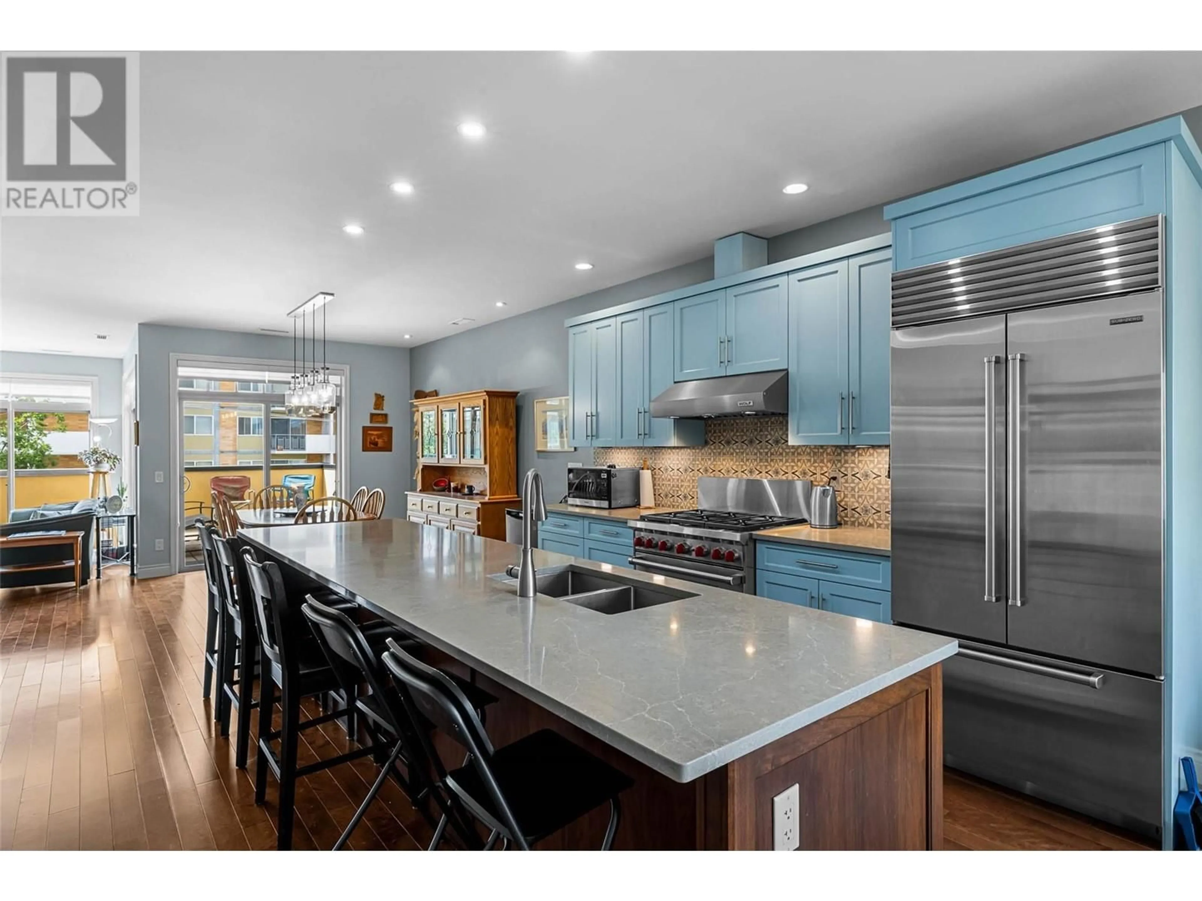 Open concept kitchen, wood/laminate floor for 401 - 370 BATTLE STREET, Kamloops British Columbia V2C2L6