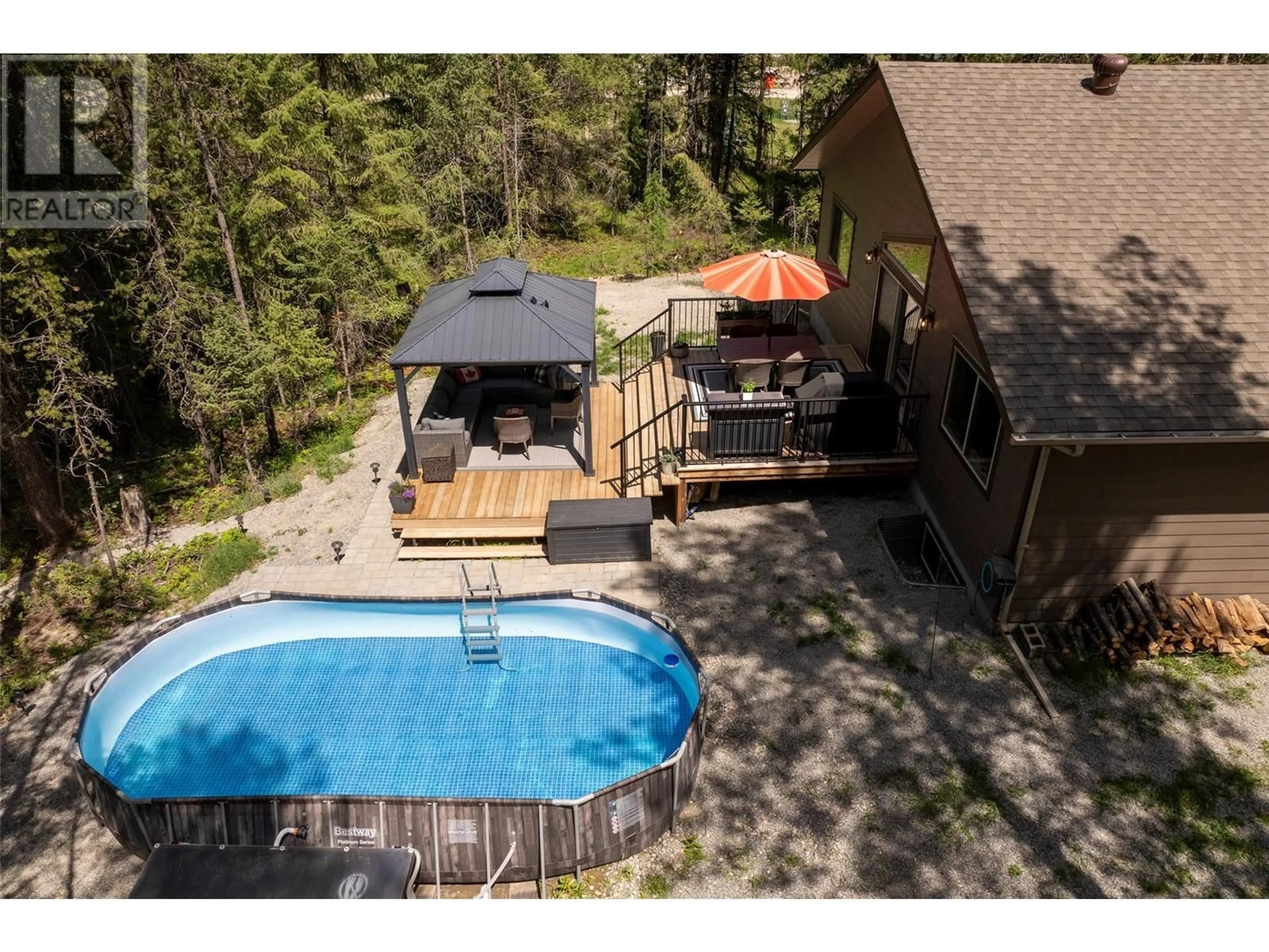 A pic from outside/outdoor area/front of a property/back of a property/a pic from drone, water/lake/river/ocean view for 6347 OSPREY LANDING COURT, Wardner British Columbia V0B2J0