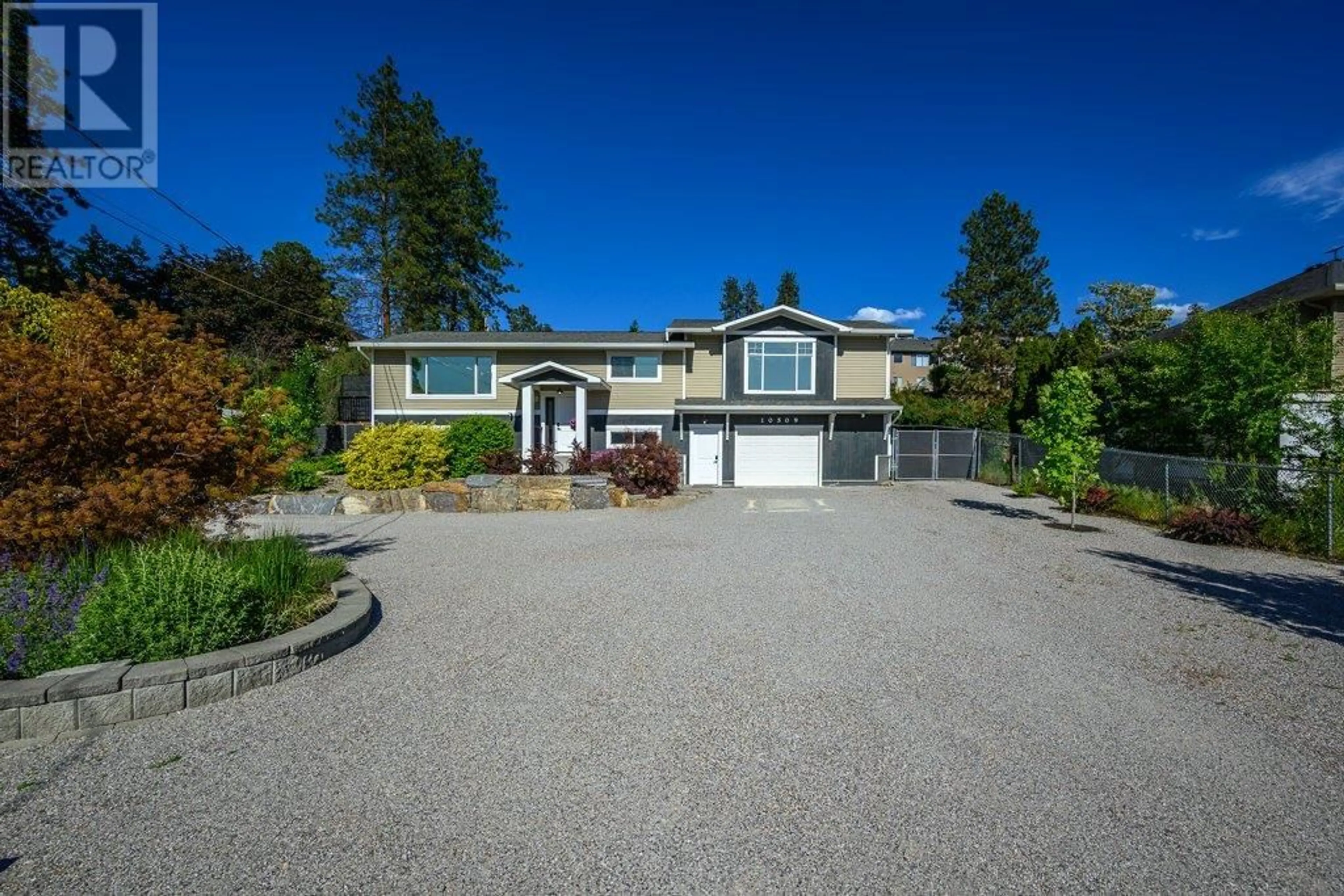 A pic from outside/outdoor area/front of a property/back of a property/a pic from drone, street for 10509 SHERMAN DRIVE, Lake Country British Columbia V4V1W2