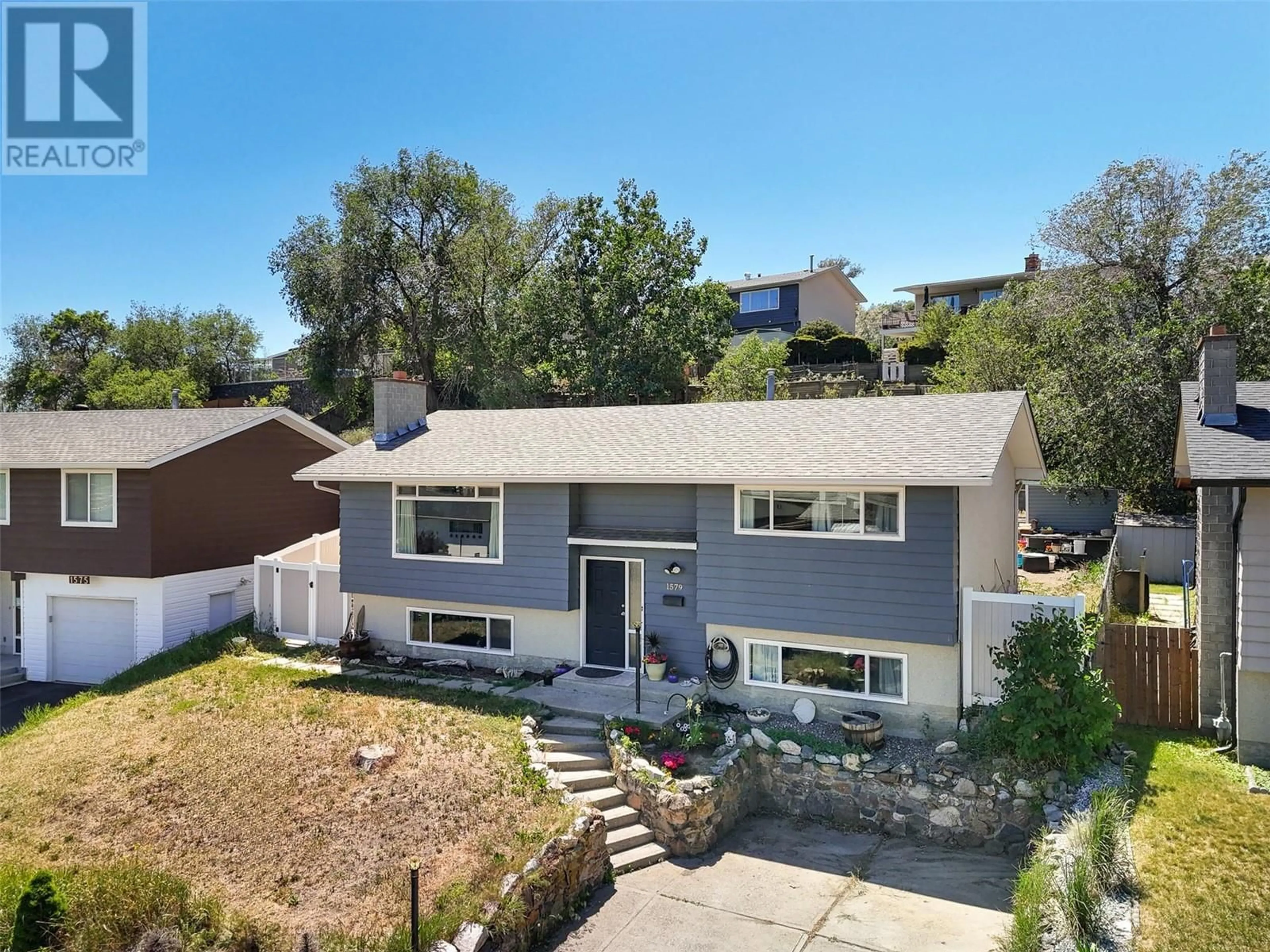A pic from outside/outdoor area/front of a property/back of a property/a pic from drone, street for 1579 SOUTHVIEW TERRACE, Kamloops British Columbia V2B7R3