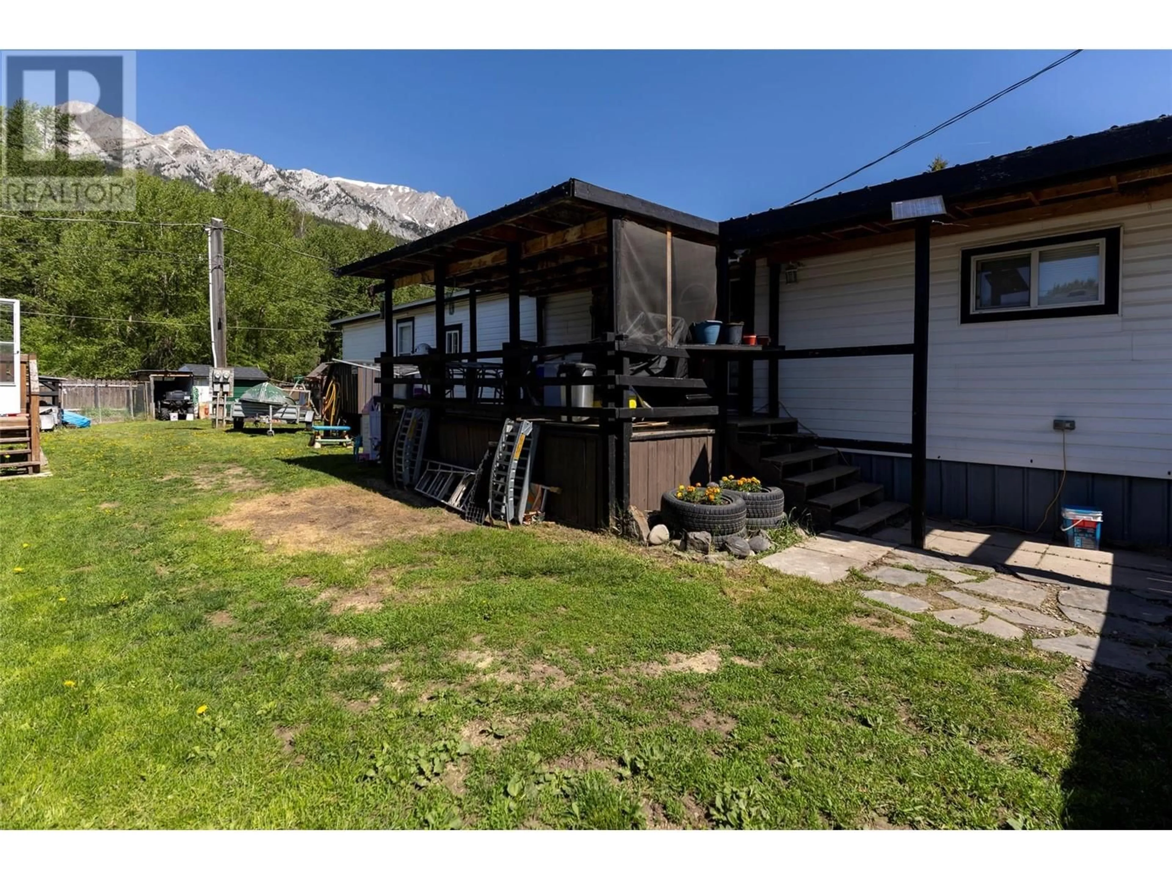 A pic from outside/outdoor area/front of a property/back of a property/a pic from drone, mountain view for 12 - 2011 3 HIGHWAY, Fernie British Columbia V0B1M5