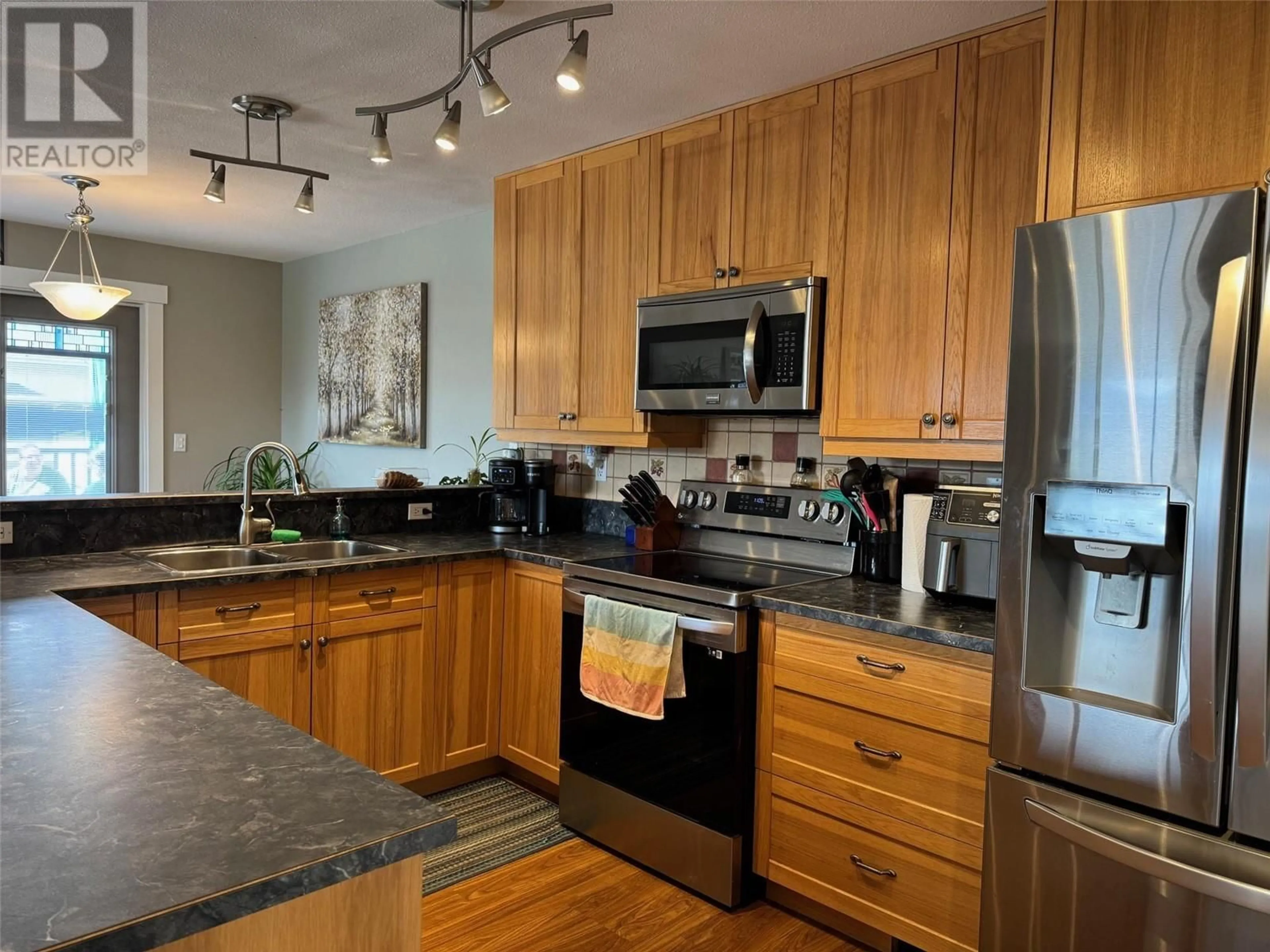 Open concept kitchen, unknown for 3399 PINERIDGE DRIVE, Merritt British Columbia V1K1J5