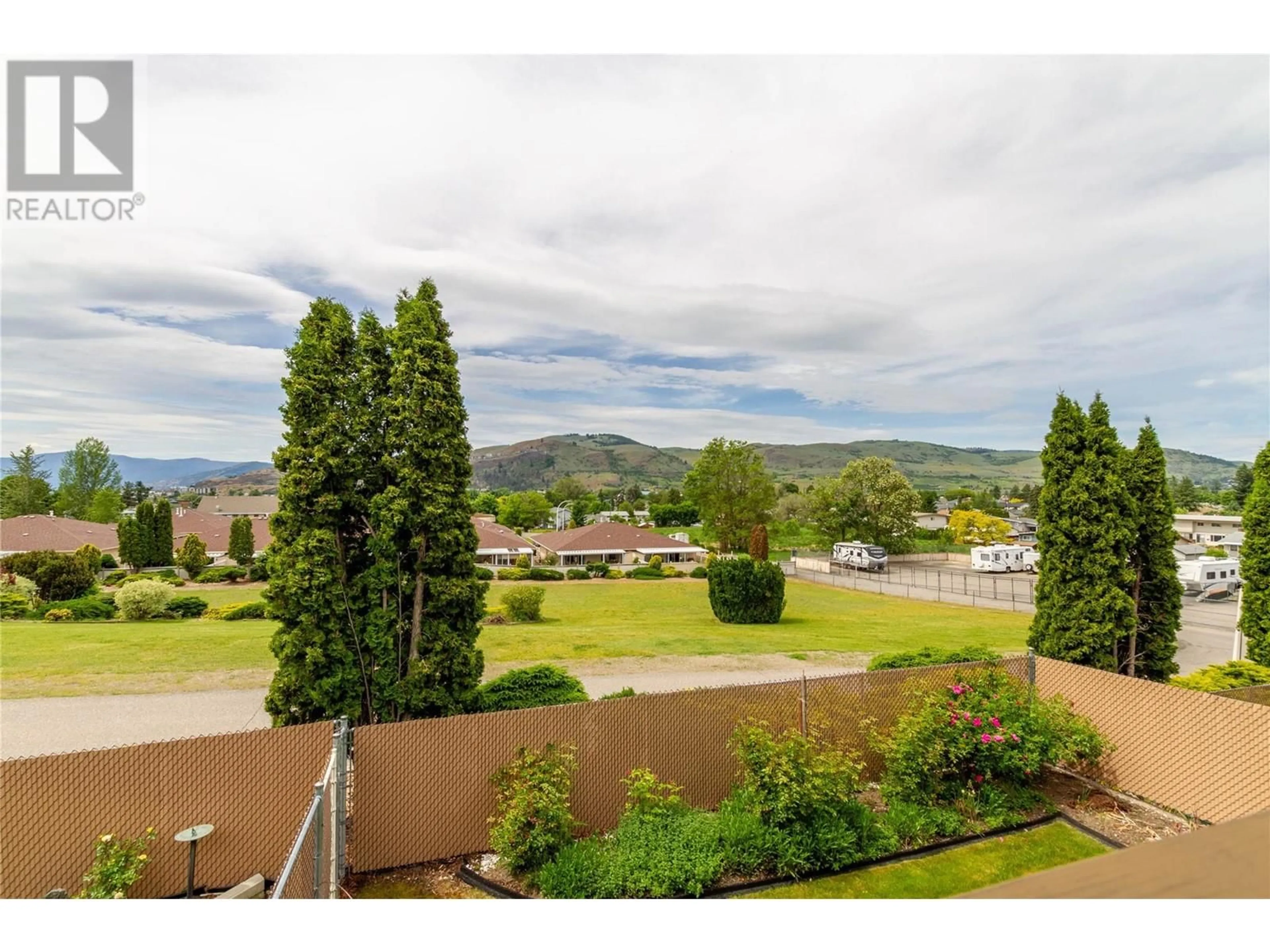 A pic from outside/outdoor area/front of a property/back of a property/a pic from drone, mountain view for 18 - 3930 20 STREET, Vernon British Columbia V1T4C9