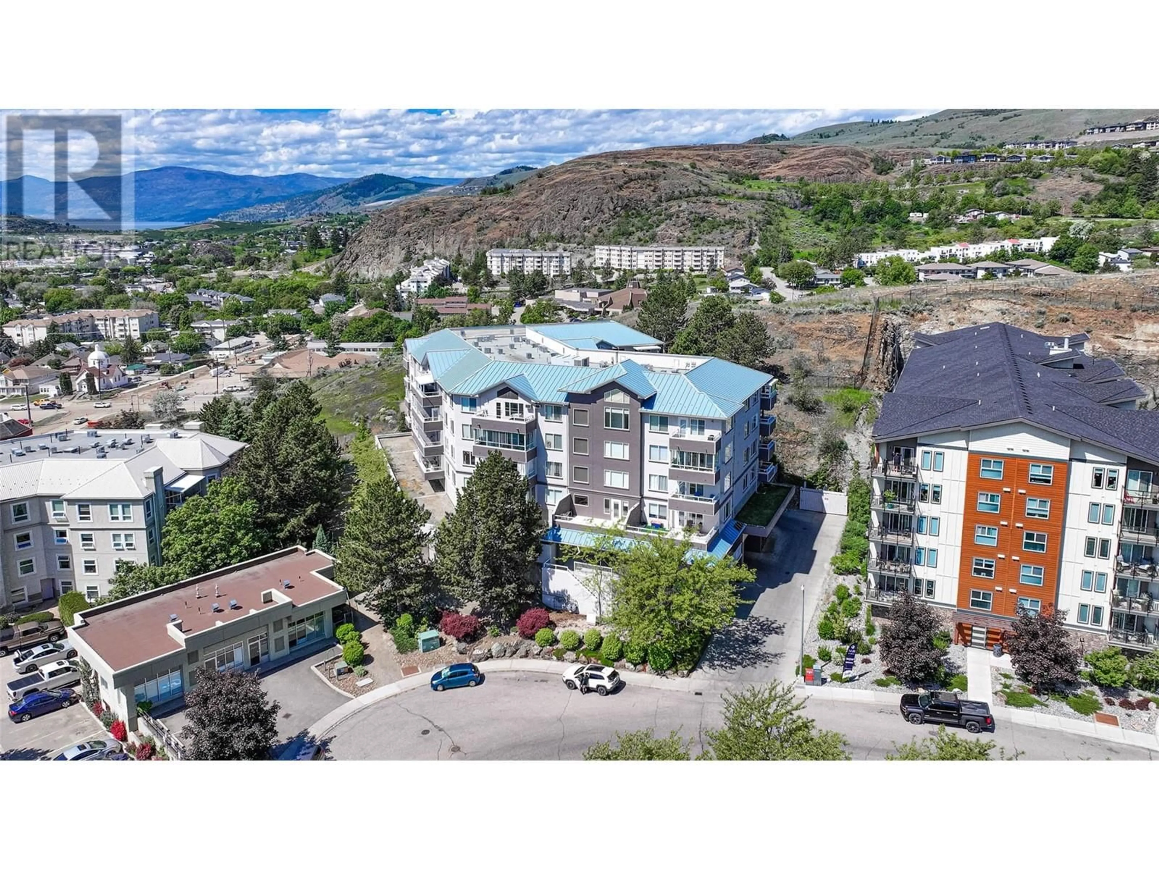 A pic from outside/outdoor area/front of a property/back of a property/a pic from drone, mountain view for 403 - 3320 CENTENNIAL DRIVE, Vernon British Columbia V1T9M4