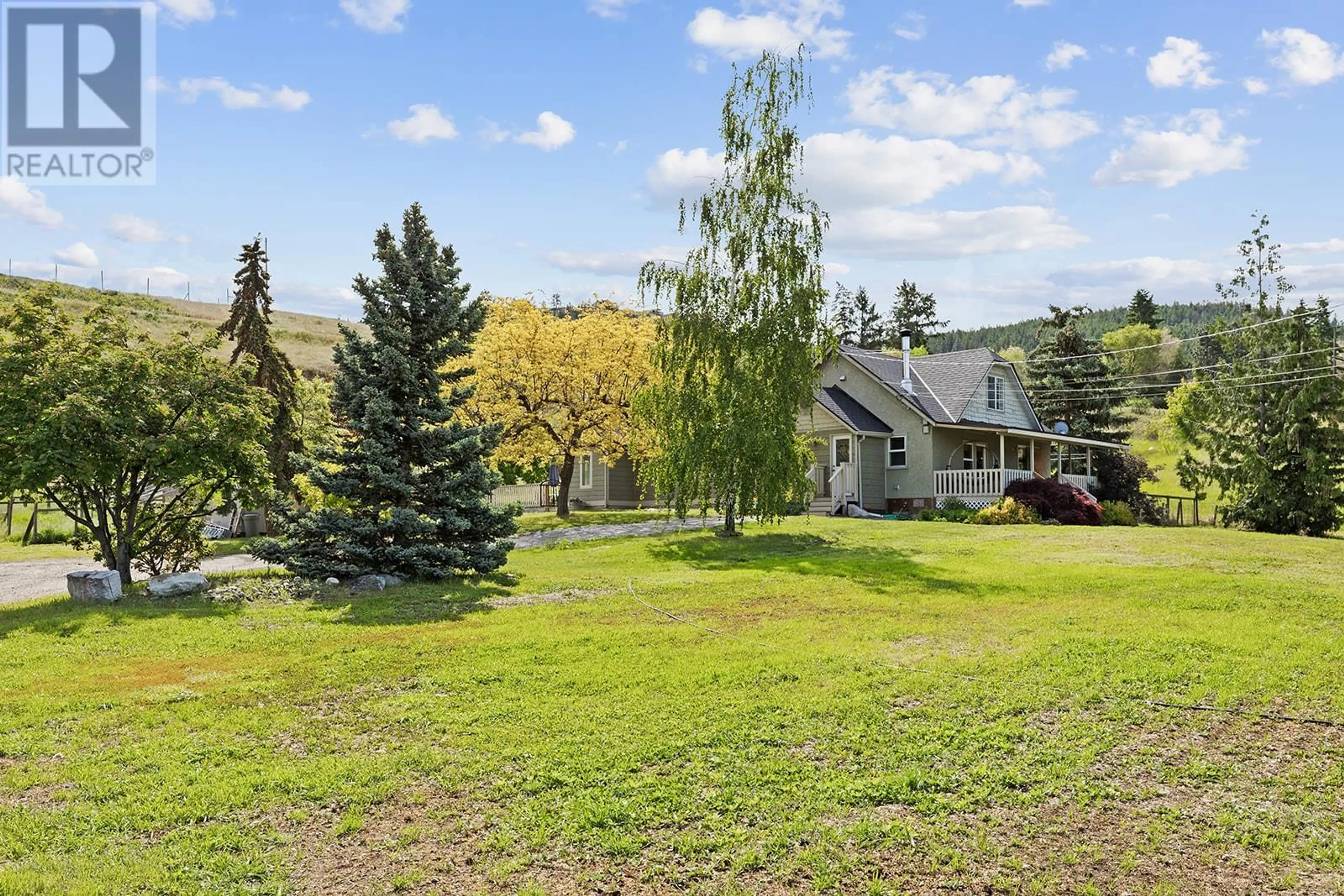 A pic from outside/outdoor area/front of a property/back of a property/a pic from drone, mountain view for 1155 MCKENZIE ROAD, Kelowna British Columbia V1P1C3