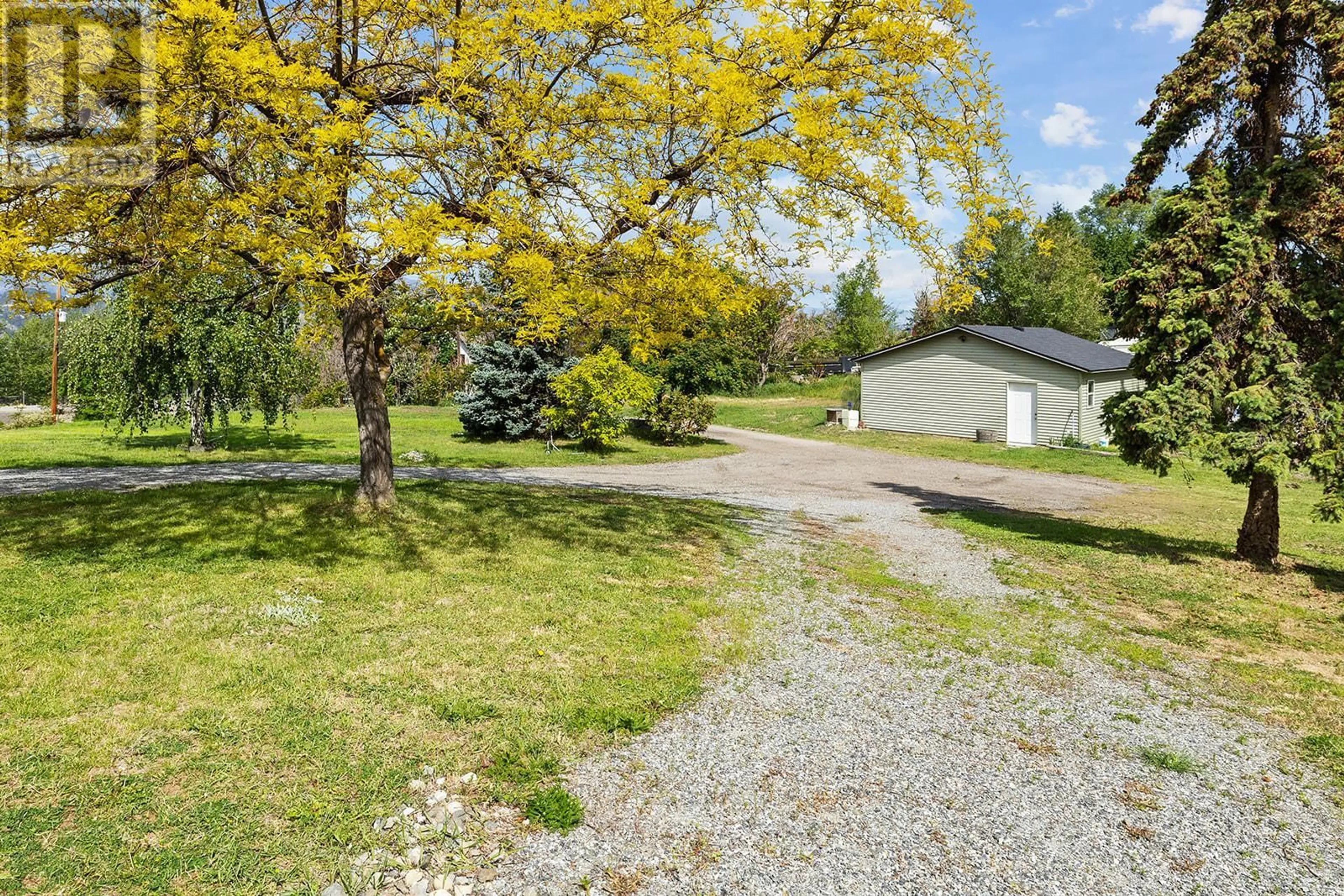 A pic from outside/outdoor area/front of a property/back of a property/a pic from drone, street for 1155 MCKENZIE ROAD, Kelowna British Columbia V1P1C3