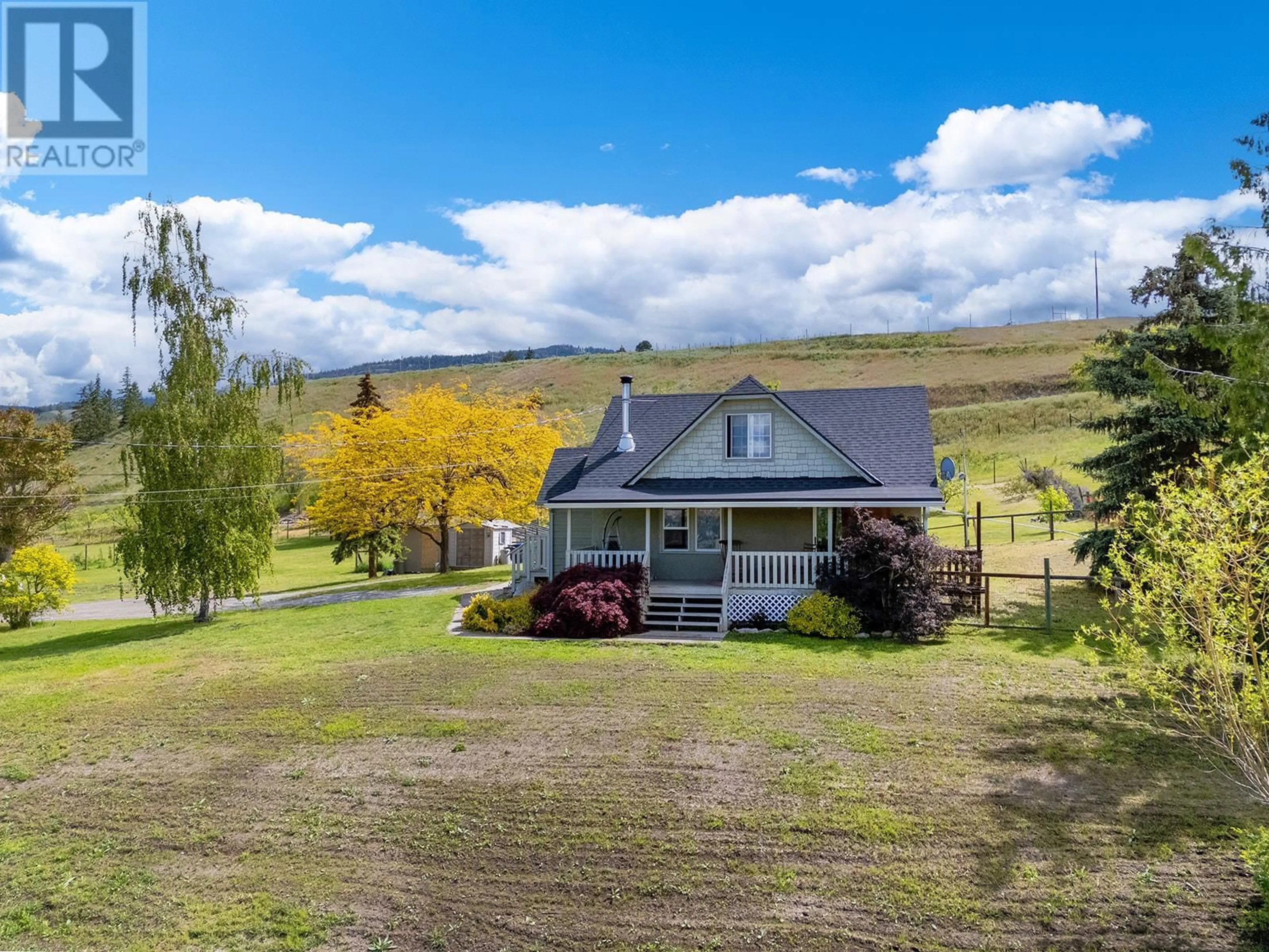 A pic from outside/outdoor area/front of a property/back of a property/a pic from drone, mountain view for 1155 MCKENZIE ROAD, Kelowna British Columbia V1P1C3