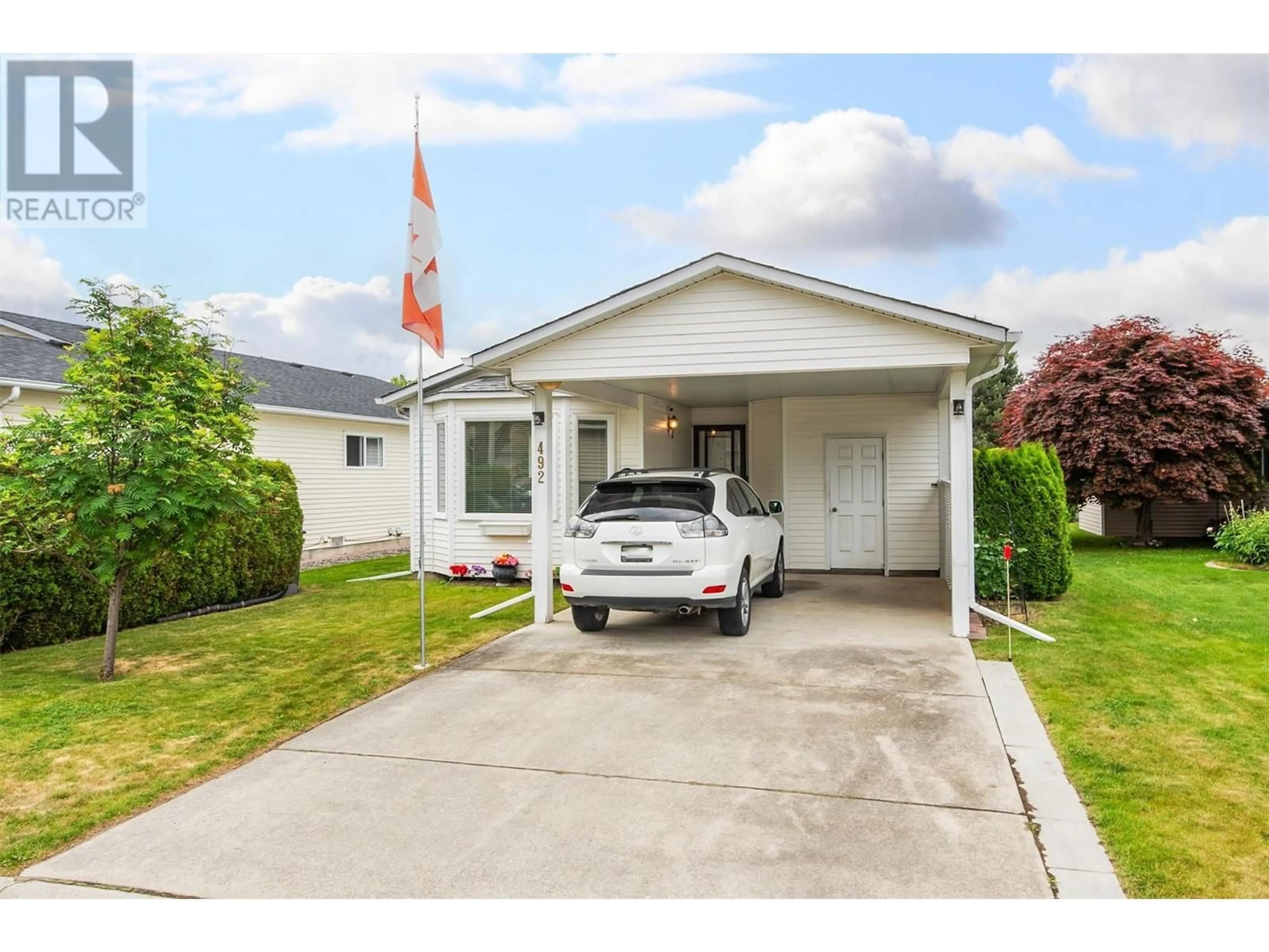 Home with vinyl exterior material, street for 492 - 1255 RAYMER AVENUE, Kelowna British Columbia V1W3S3