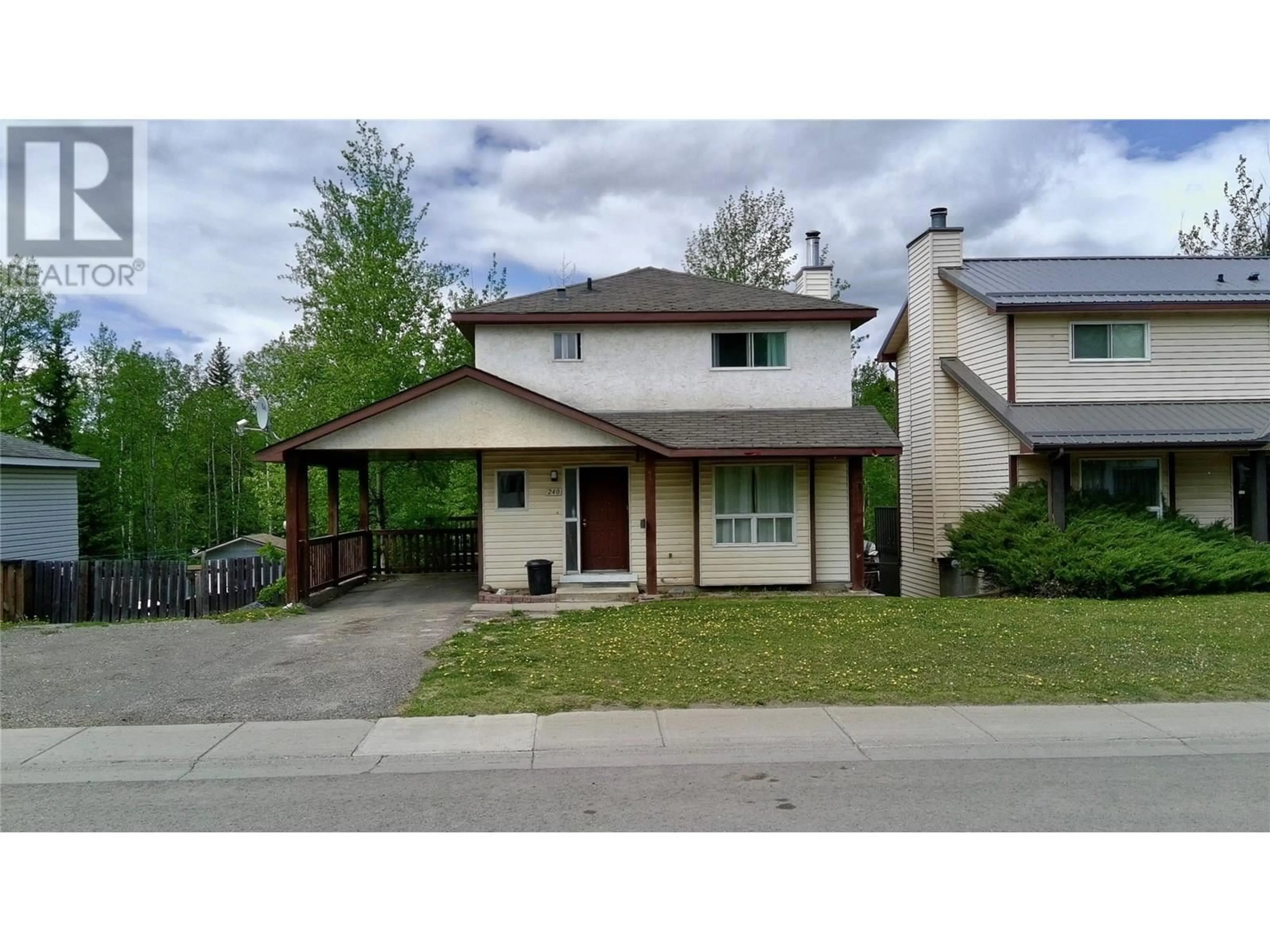Home with vinyl exterior material, street for 240 BERGERON DRIVE, Tumbler Ridge British Columbia V0C2W0
