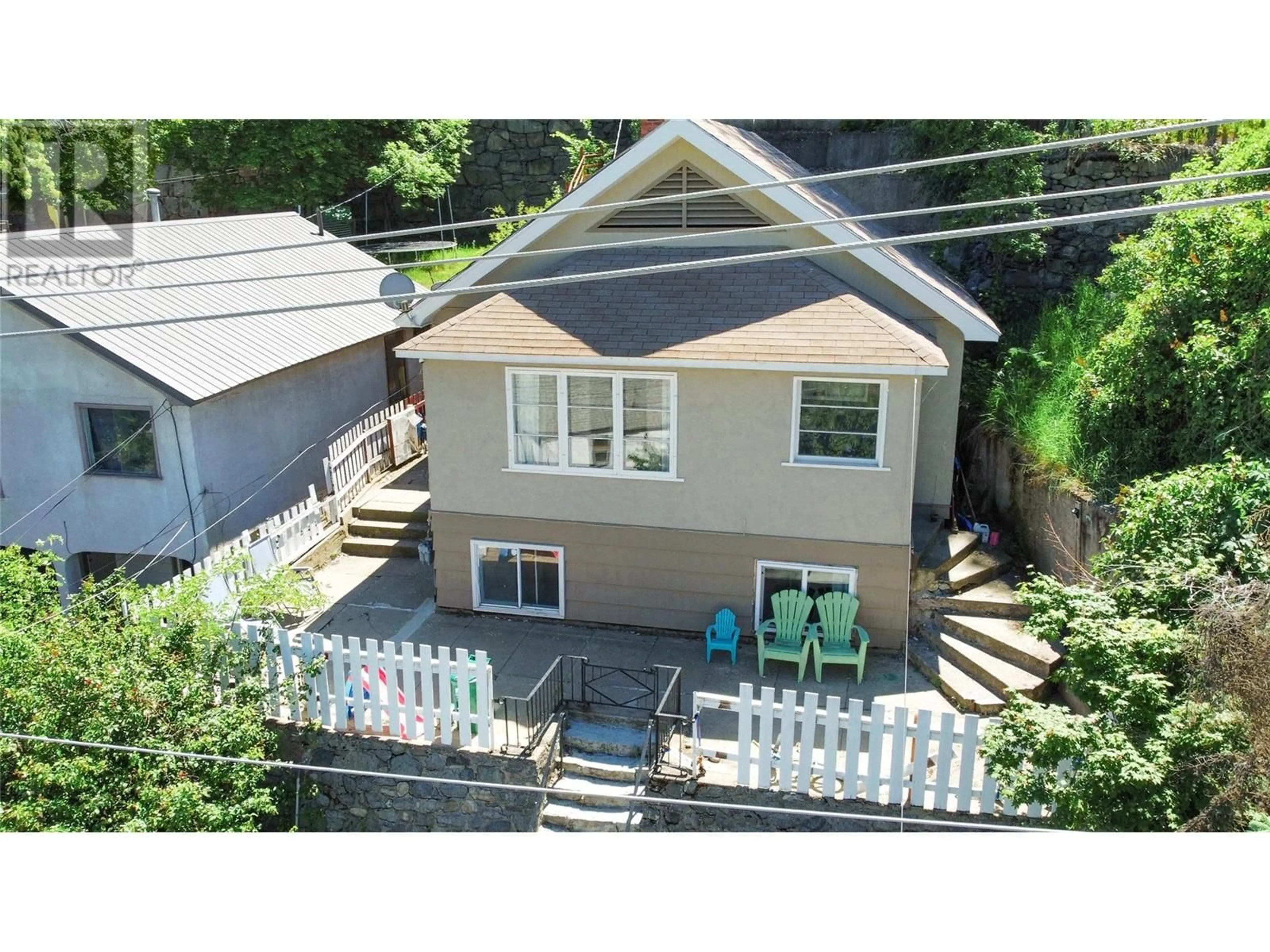 A pic from outside/outdoor area/front of a property/back of a property/a pic from drone, street for 1730 TOPPING STREET, Trail British Columbia V1R4G3