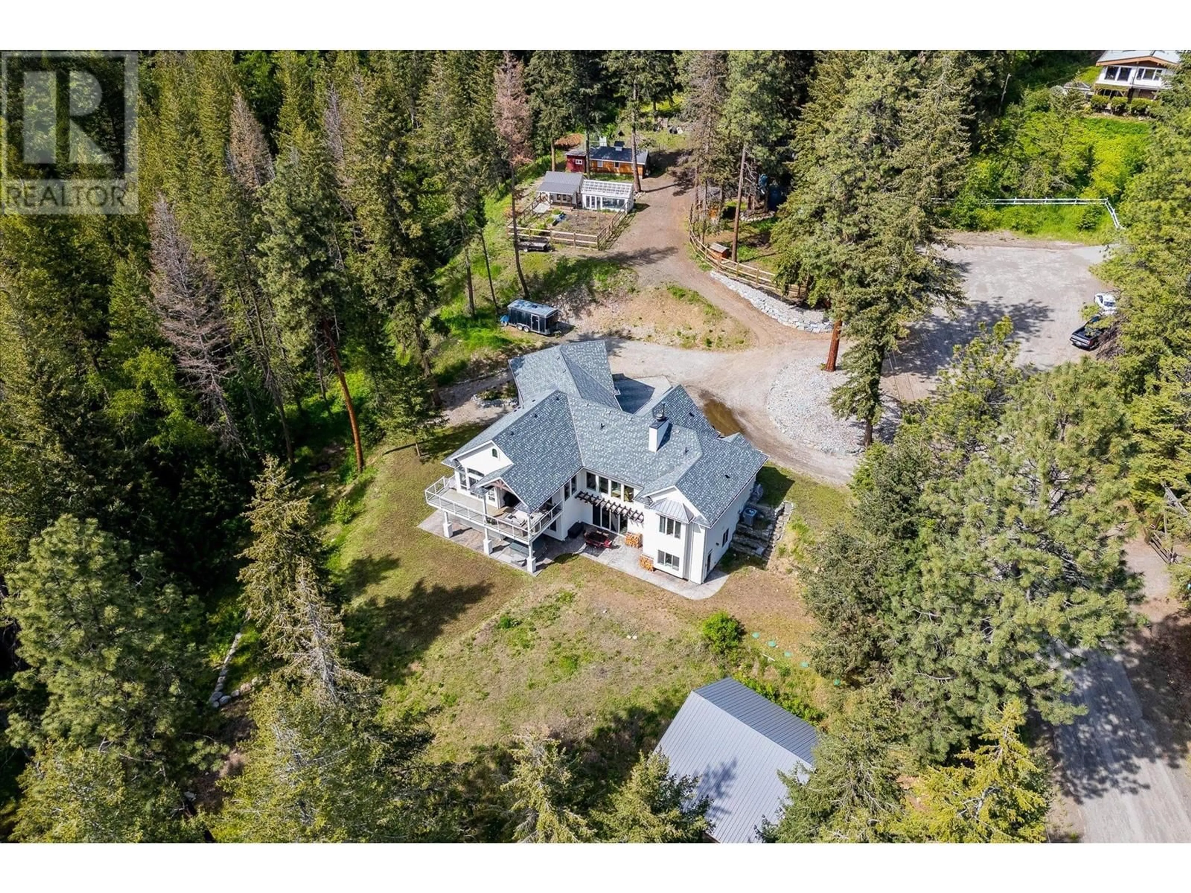 A pic from outside/outdoor area/front of a property/back of a property/a pic from drone, unknown for 7844 CHEW ROAD, Vernon British Columbia V1B3N6