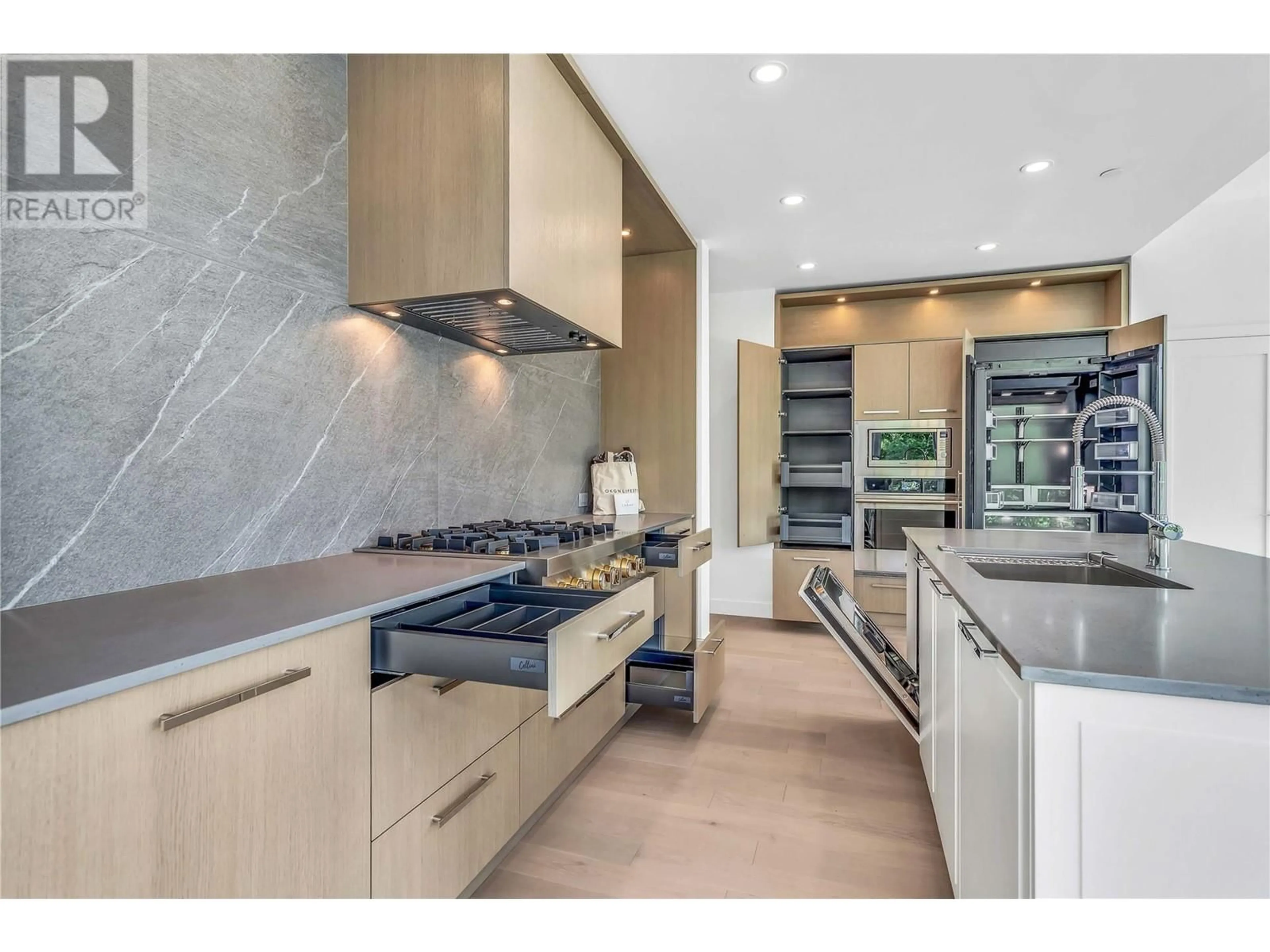 Contemporary kitchen, ceramic/tile floor for 315 - 3389 LAKESHORE ROAD, Kelowna British Columbia V1W0G5