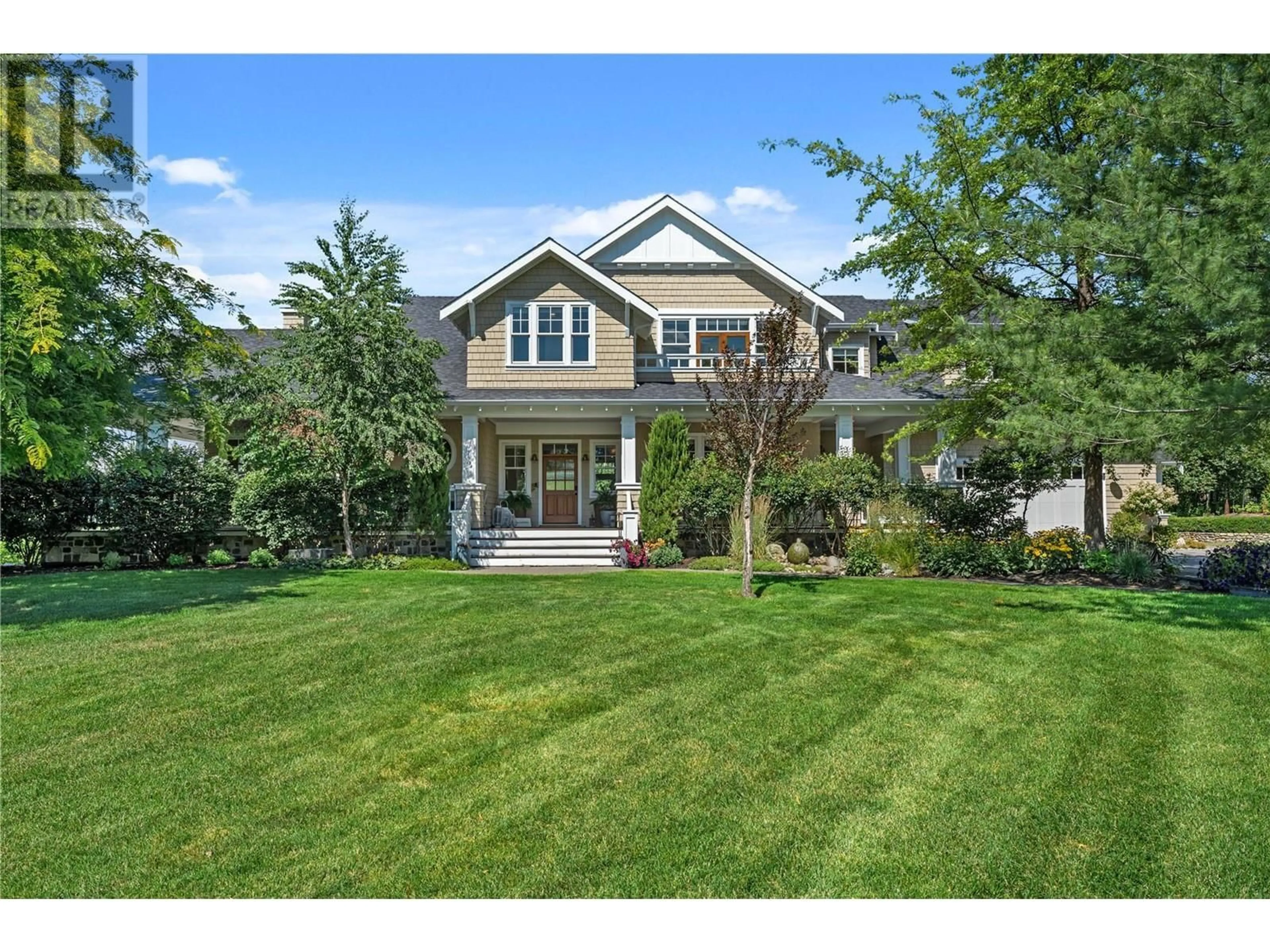 Home with vinyl exterior material, street for 4079 JUNE SPRINGS ROAD, Kelowna British Columbia V1W4E2