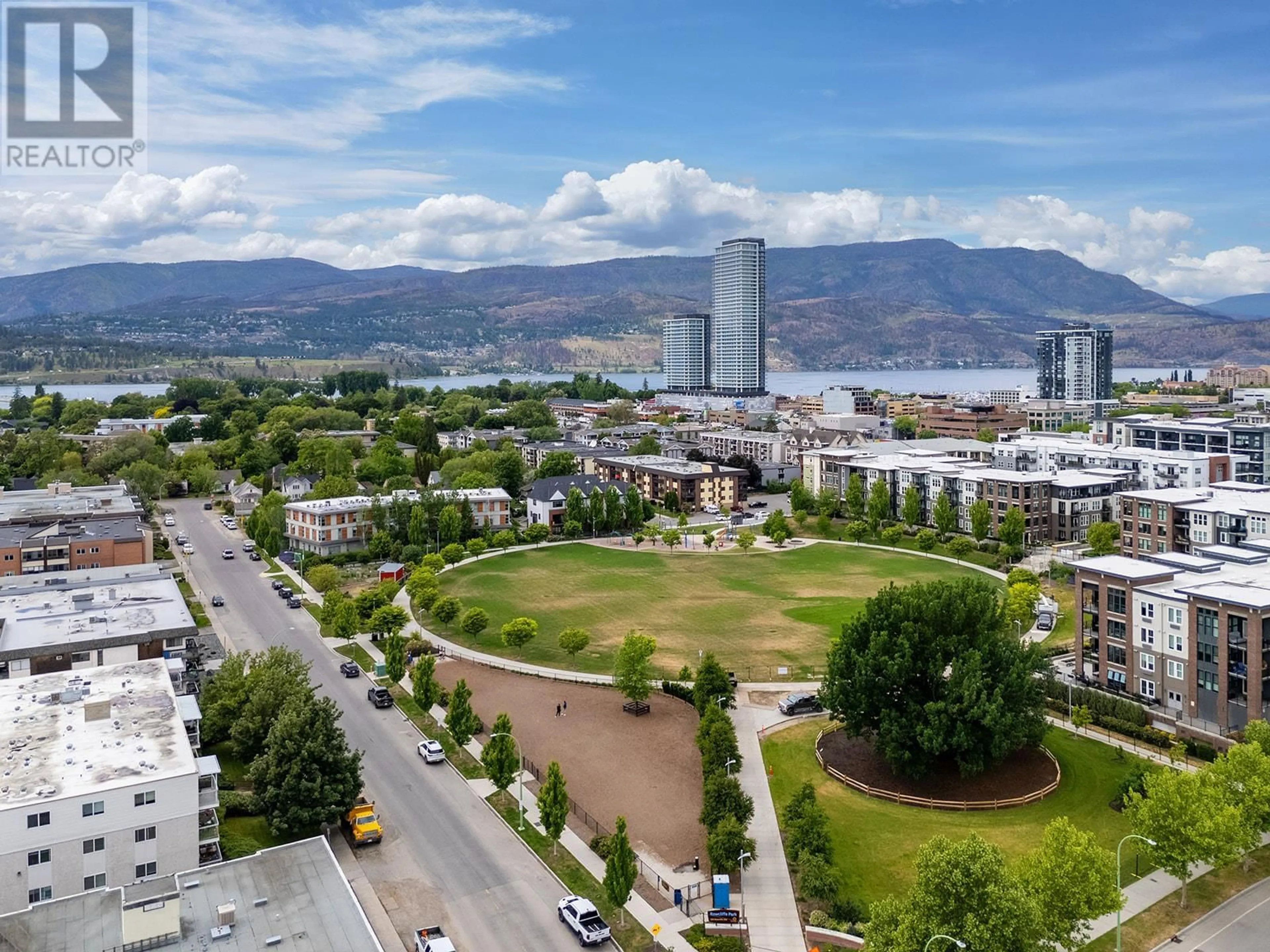 A pic from outside/outdoor area/front of a property/back of a property/a pic from drone, mountain view for 203 - 625 ROWCLIFFE AVENUE, Kelowna British Columbia V1Y5Y8